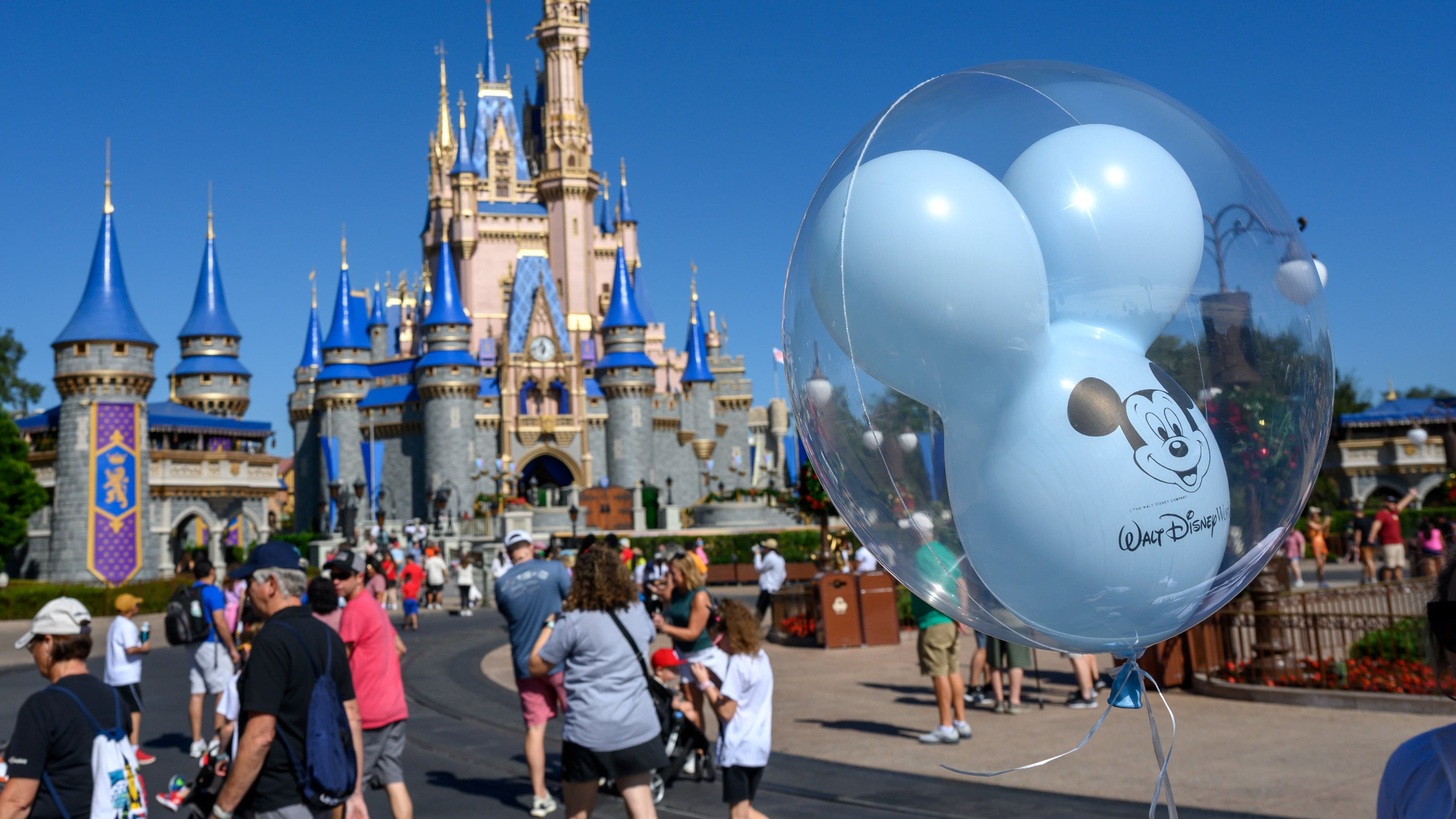 Guests visit the Magic Kingdom at Walt Disney World in Bay Lake, Fla. Gluten-free food options are easy to find. (Todd Anderson/The New York Times 2023)