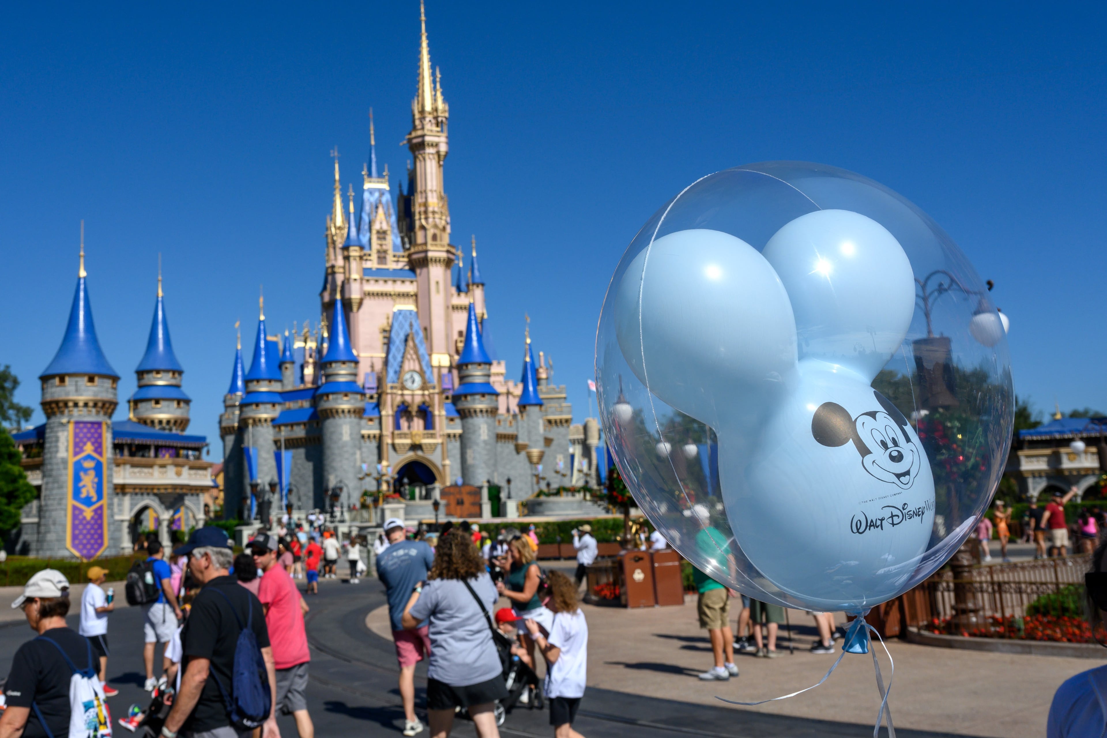Guests visit the Magic Kingdom at Walt Disney World in Bay Lake, Fla. Gluten-free food options are easy to find. (Todd Anderson/The New York Times 2023)