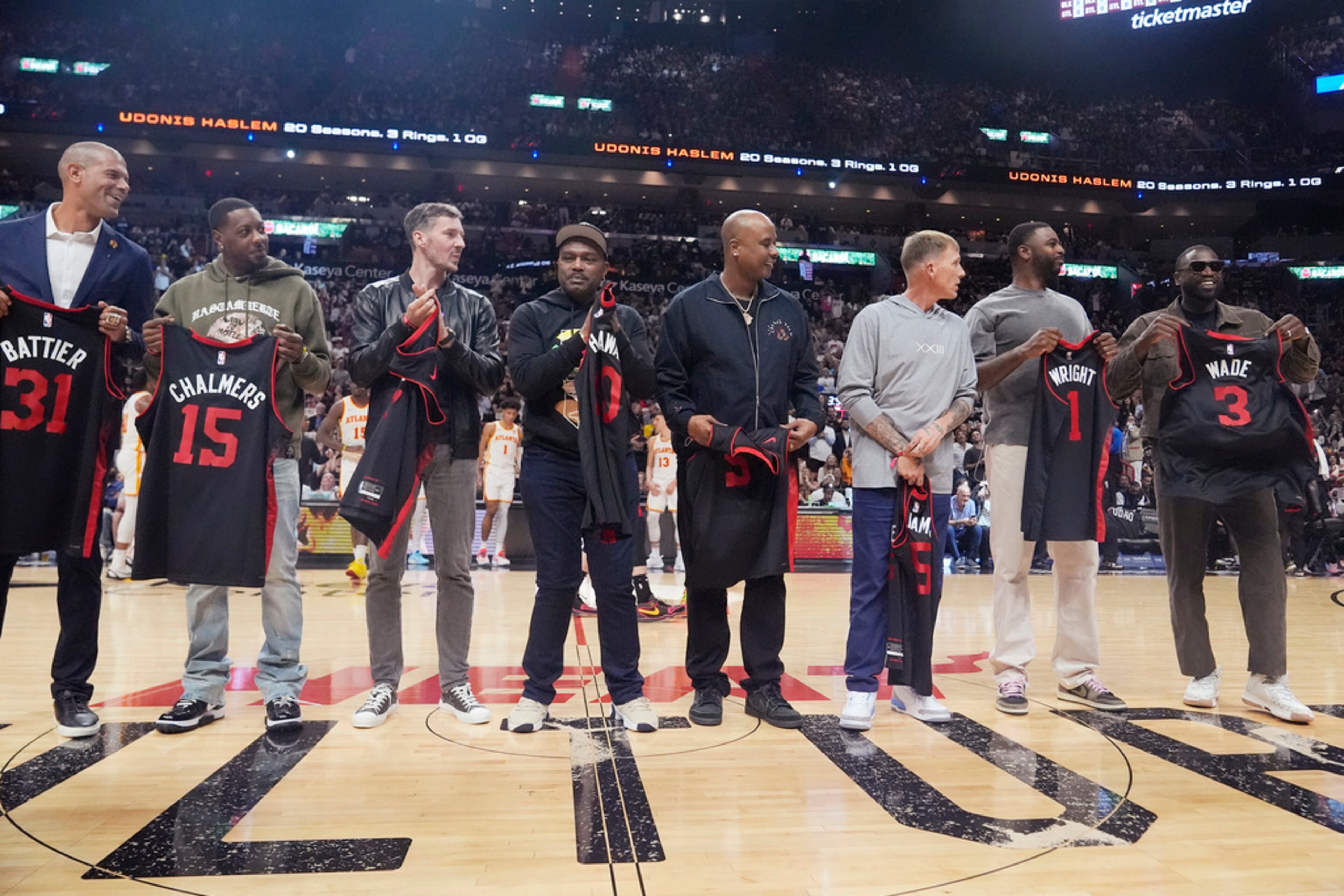 Former Miami Heat players are introduced before a half time ceremony honoring Udonis Haslem at an NBA basketball game against the Atlanta Hawks, Friday, Jan. 19, 2024, in Miami. (AP Photo/Marta Lavandier)