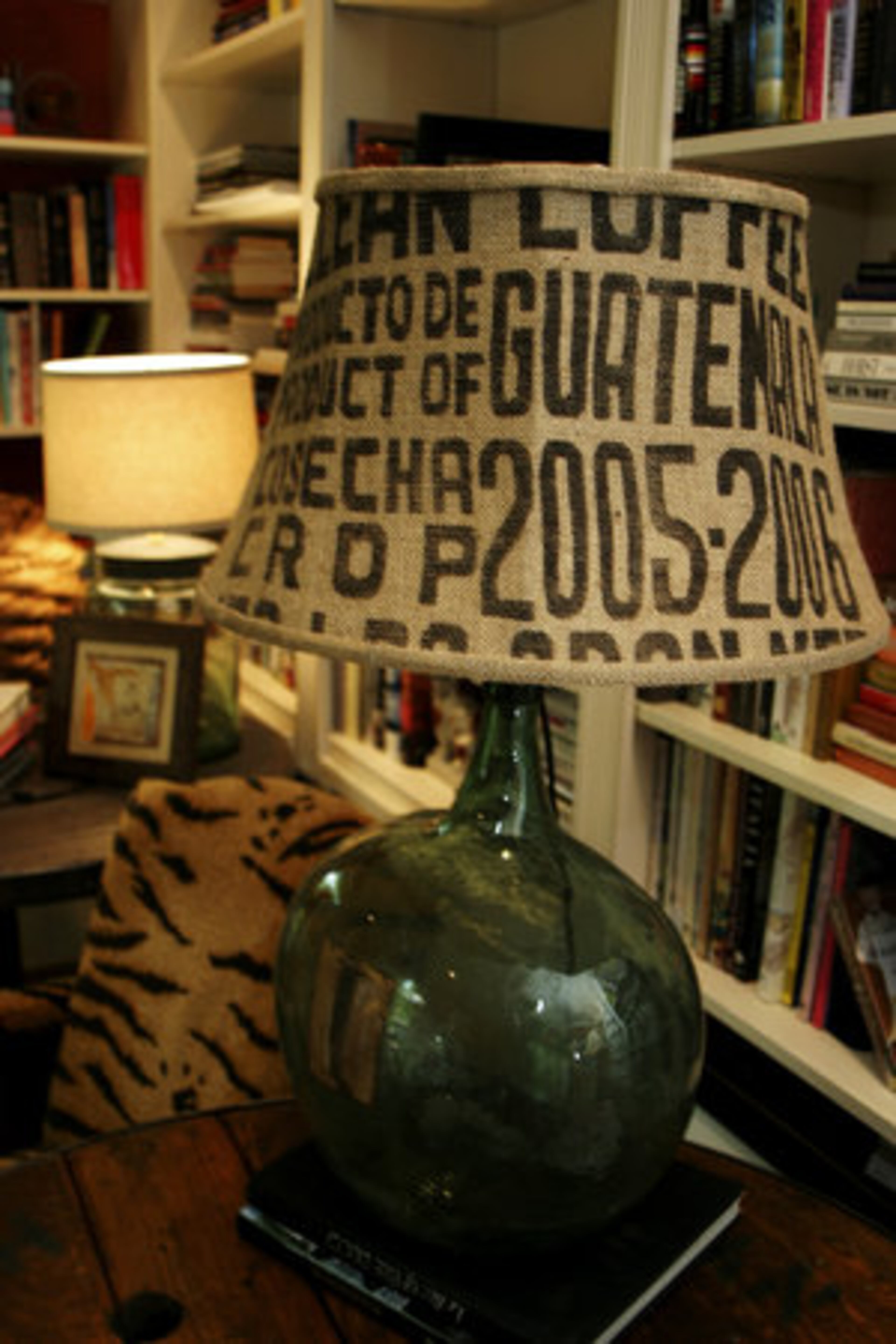 This shade on a lamp in the library is one of Mary's custom creations. Clients can have whatever they desire inscribed on the "fairly new coffee bean bag" she uses as a canvas.