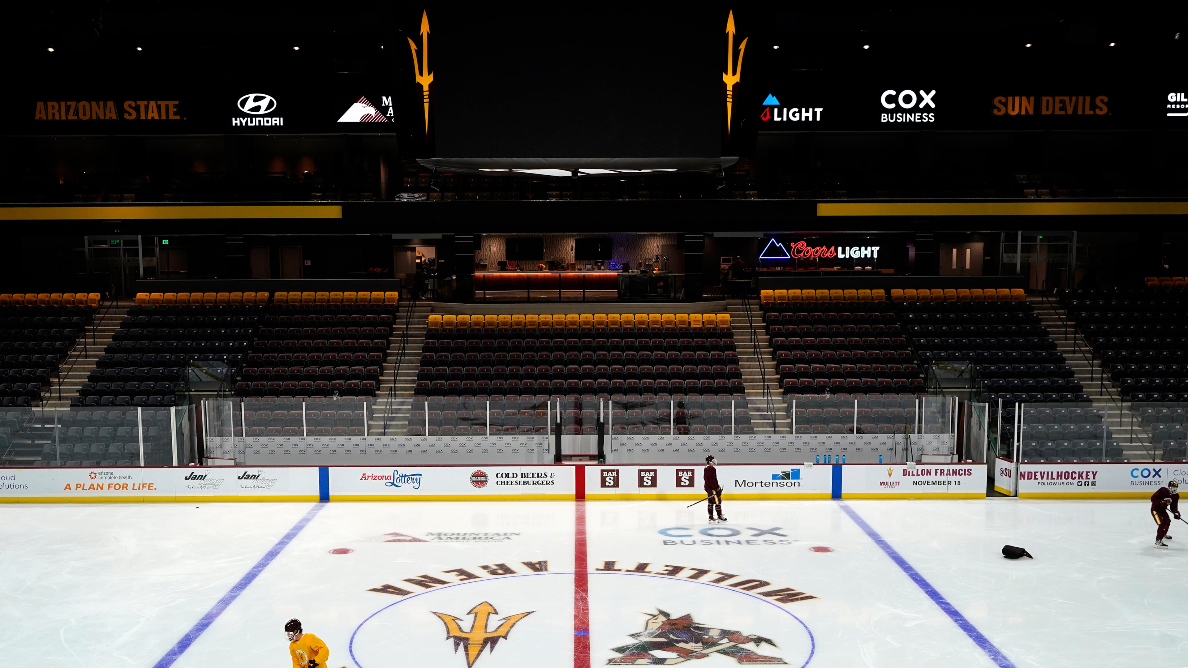 FILE - Members of the Arizona State University hockey team skate on the ice at the new Mullett Arena, Oct. 24, 2022, in Tempe, Ariz. (AP Photo/Ross D. Franklin, File)