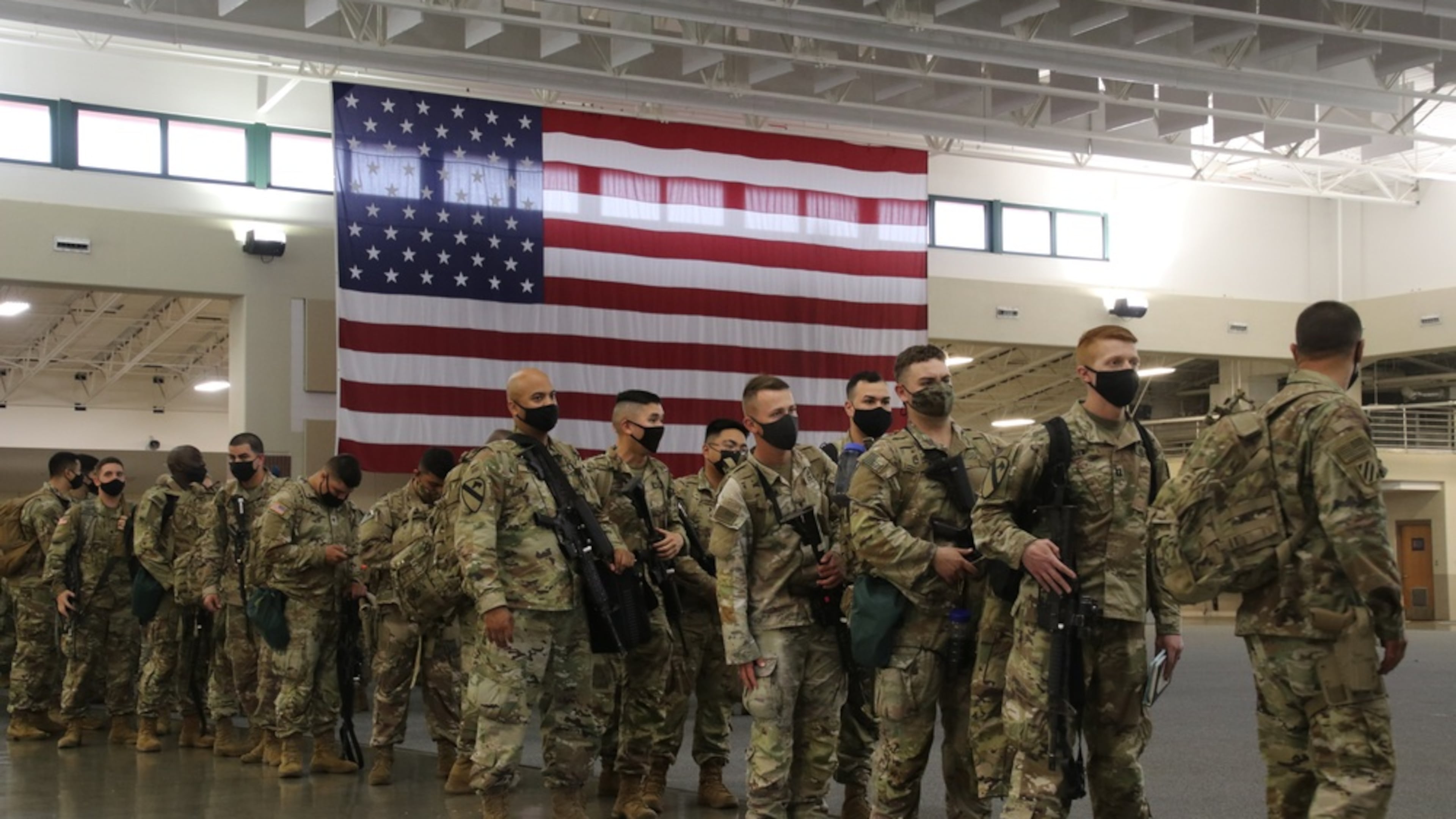 Soldiers assigned to the 1st Armored Brigade Combat Team, 3rd Infantry Division, deploy to Germany from Hunter Army Airfield in Georgia on Sunday amid the Russian invasion of Ukraine. U.S. Army photo by Capt. John D. Howard Jr.