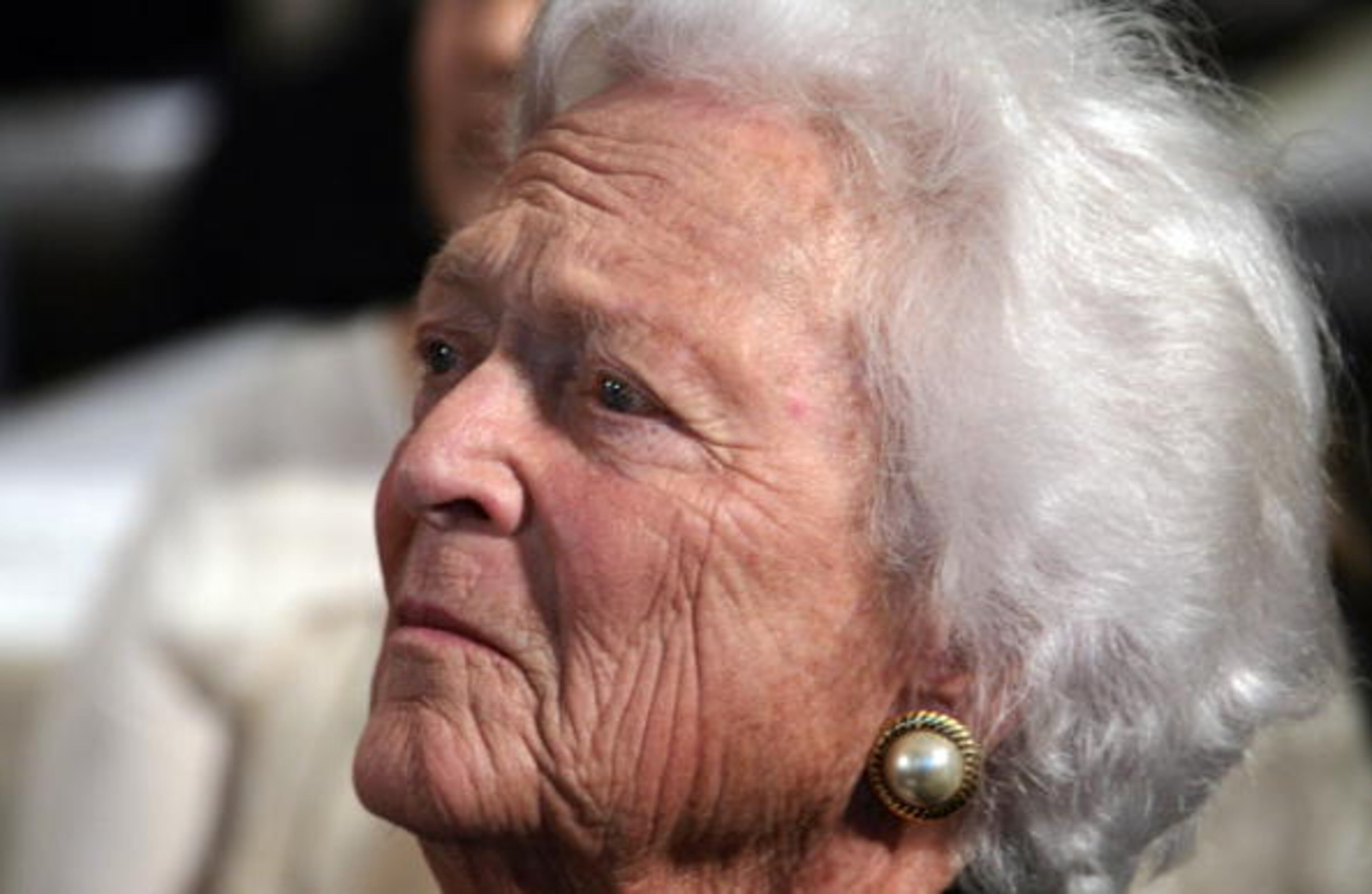 New York, UNITED STATES: Former First Lady Barbara Bush looks on as her son US President George W. Bush and First Lady Laura Bush make remarks during the White House Conference on Global Literacy 18 September 2006 at the New York Public Library in New York, NY. AFP PHOTO/Jim WATSON (Photo credit should read JIM WATSON/AFP/Getty Images)