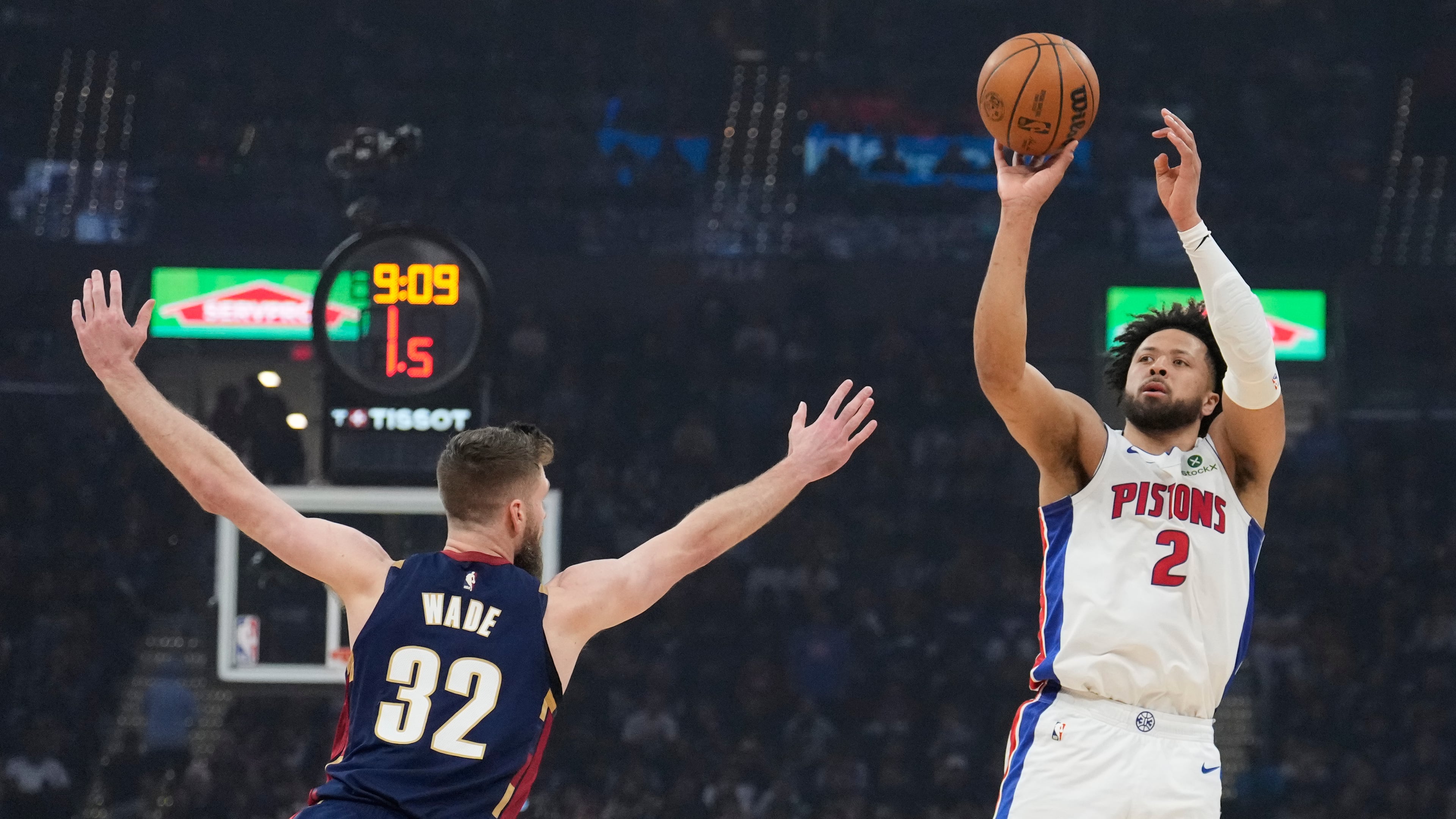 Detroit Pistons' Cade Cunningham (2) shoots over Cleveland Cavaliers' Dean Wade (32) in the first half of Game 6 of a second-round NBA basketball playoffs series Friday, May 15, 2026, in Cleveland. (AP Photo/Sue Ogrocki)