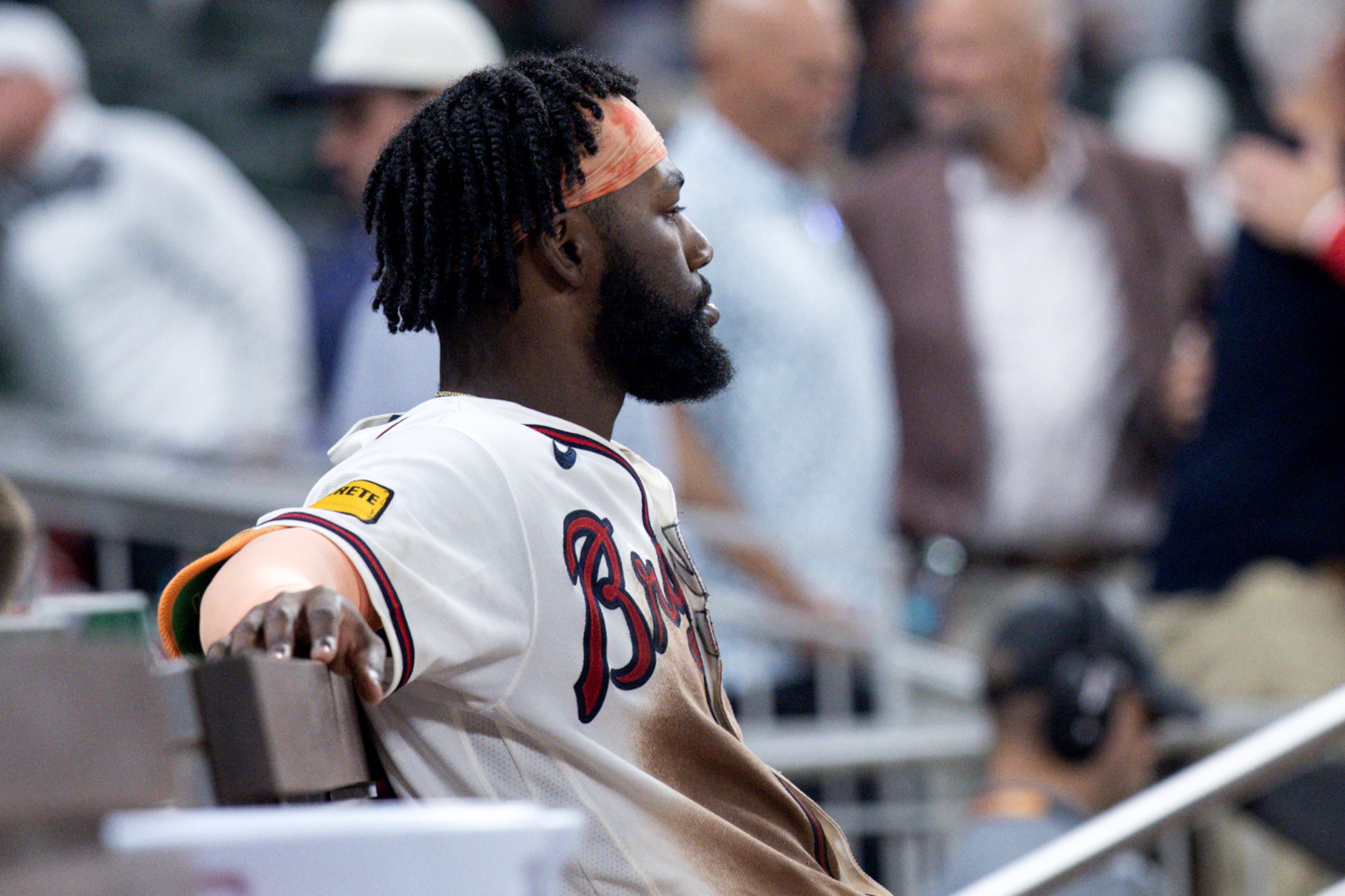 Atlanta Braves center fielder Michael Harris II (23) reacts in the dugout after losing to the Los Angeles Dodgers in Game 4 of the MLB National League Division Series between the Atlanta Braves and the Los Angeles Dodgers, Wednesday, Oct. 7, 2026, in Atlanta. The Dodgers defeated the Braves 3 games to 1. (Miguel Martinez/AJC)