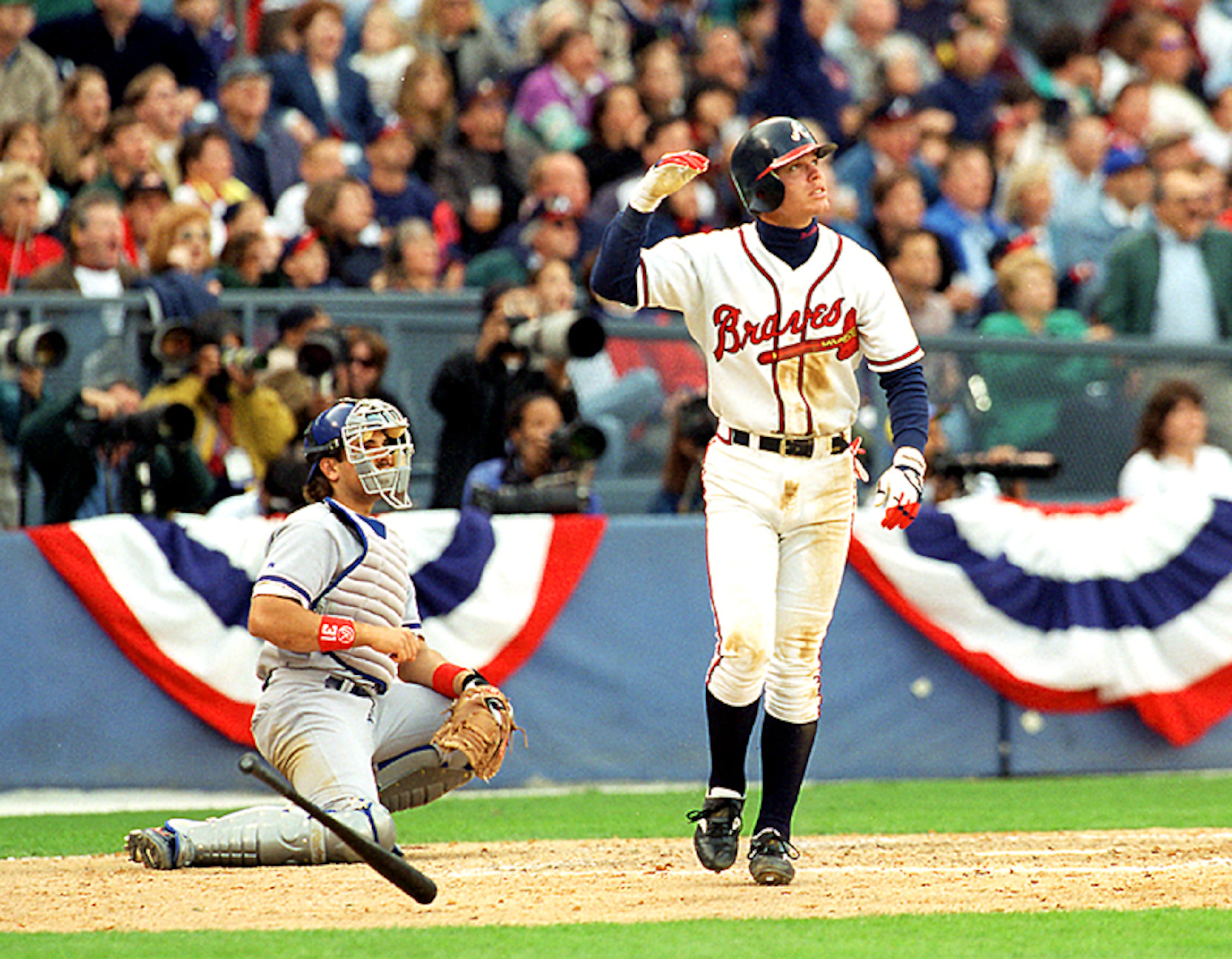 Atlanta Braves third baseman Chipper Jones watches his home run fly out of the park in the 4th inning of Game 3 of the National League Division Series against the Los Angeles Dodgers in Atlanta.