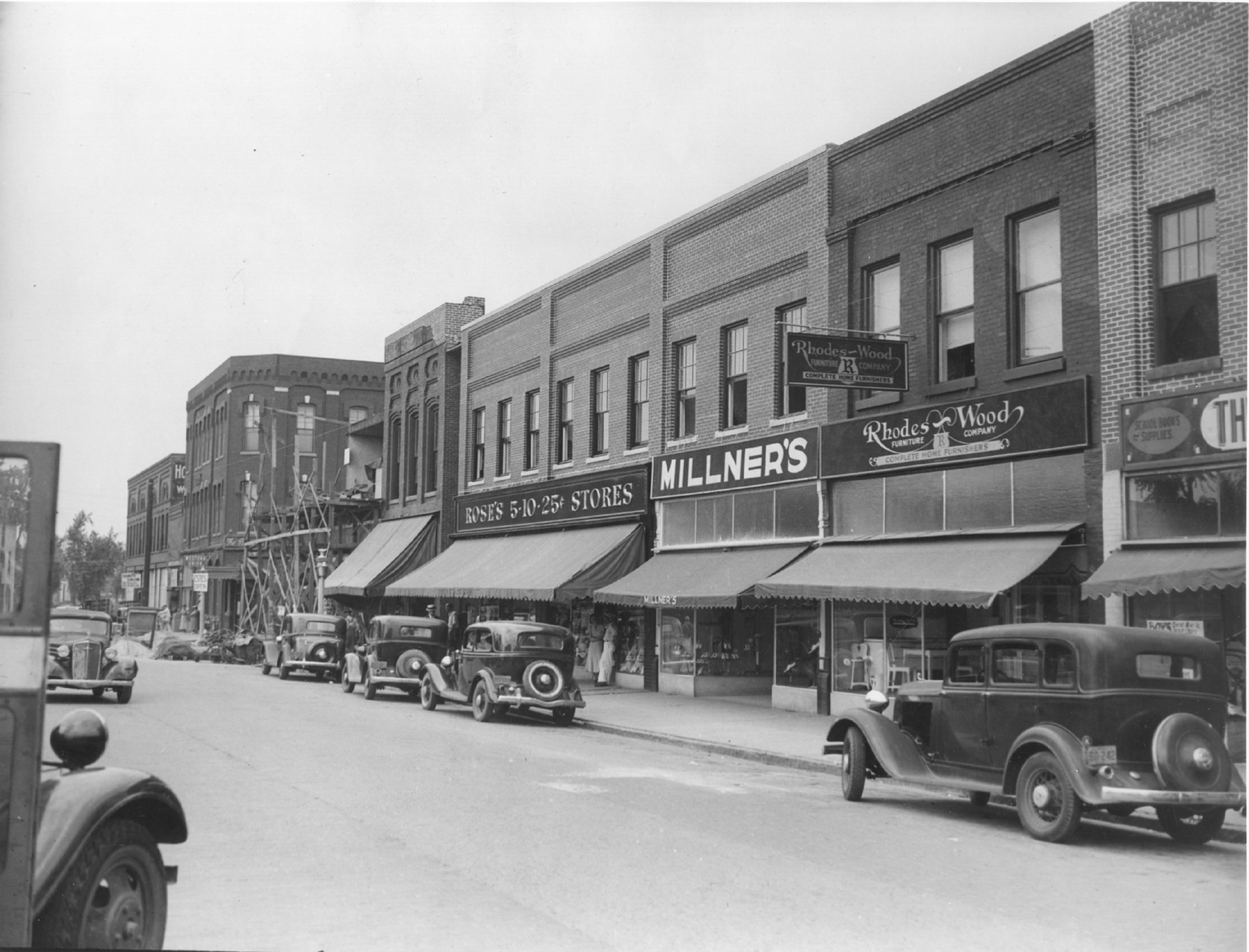 A 1930s era photo of Washington Street in Gainesville. The construction shown might indicate that this picture was shot in 1936 and repairs were being made to buildings damaged in the devastating tornado that occured on April 6, 1936.