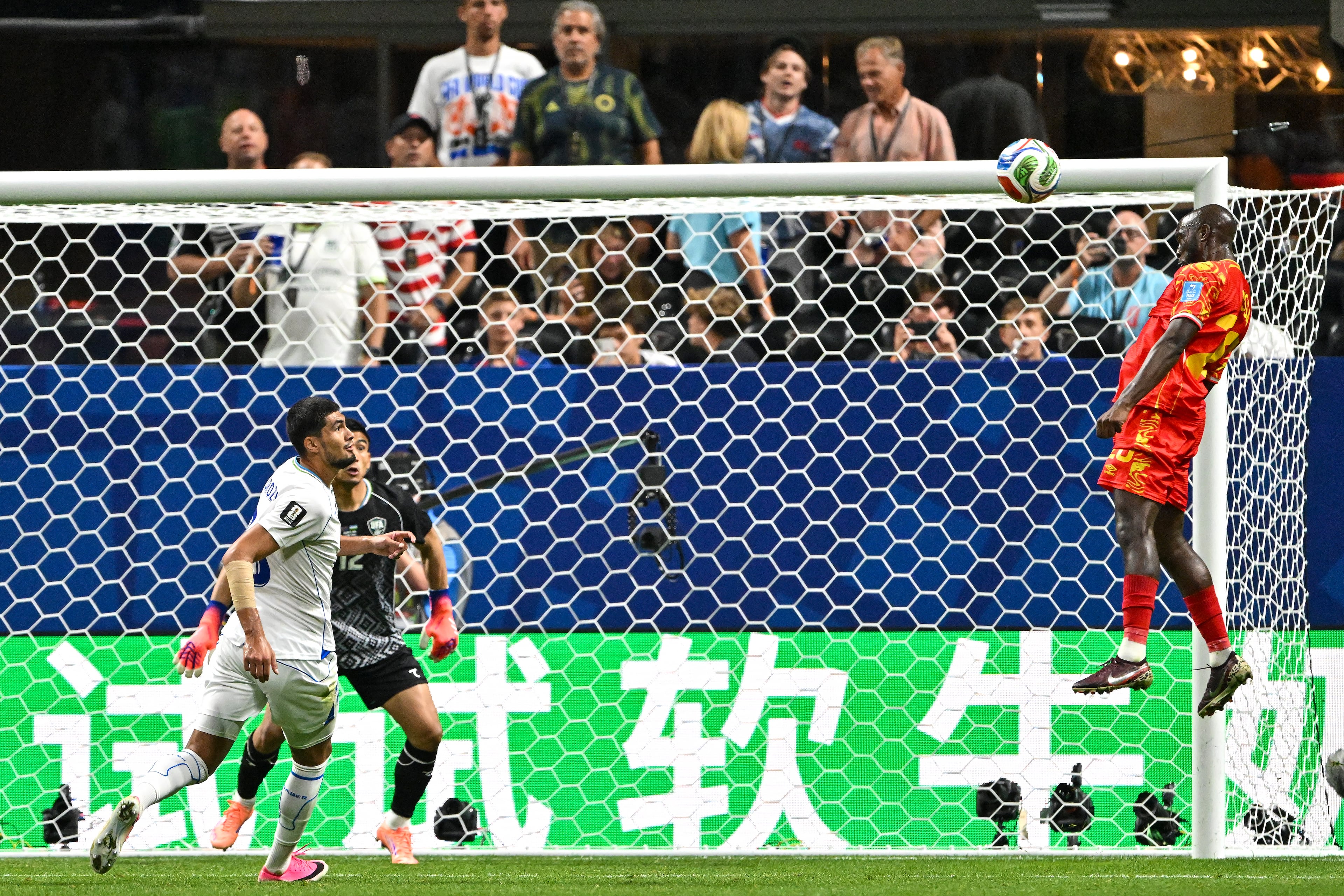DR Congo forward Yoane Wissa (20) makes an attempt on the goal as Uzbekistan goalkeeper Abduvohid Nematov (12) defends during the second half of a FIFA World Cup match at Atlanta Stadium (Mercedes-Benz Stadium) on Saturday, June 27, 2026, in Atlanta. (Hyosub Shin/AJC)