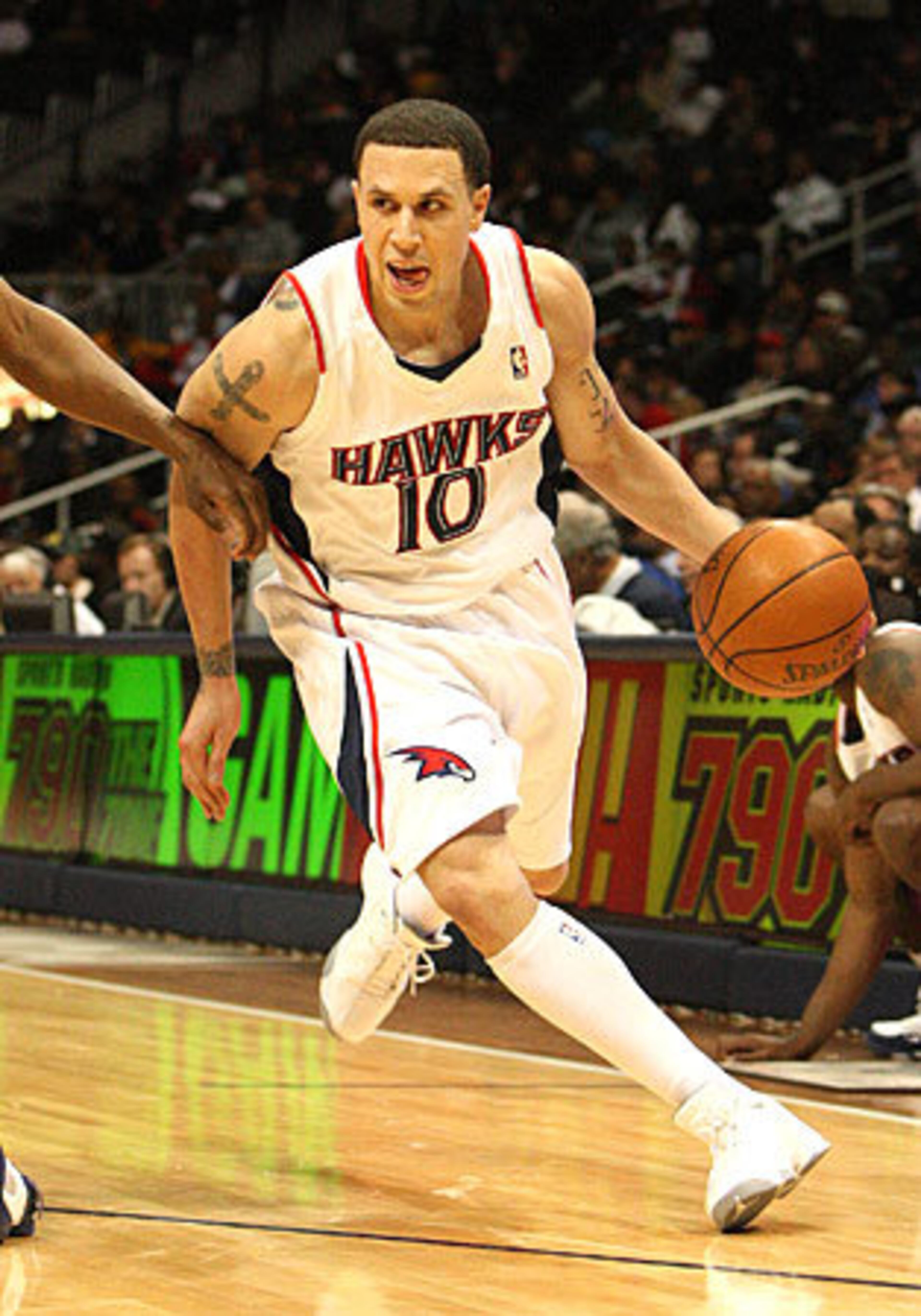 RIGHT: Mike Bibby has a monster season in the final year of his contract, giving the Hawks one of the most potent starting backcourt duos (along with All-Star Joe Johnson) in the Eastern Conference. With Bibby and Johnson playing at a high level, particularly on the offensive end of the floor, the Hawks become an extremely difficult team to deal with because few teams can match up with them.