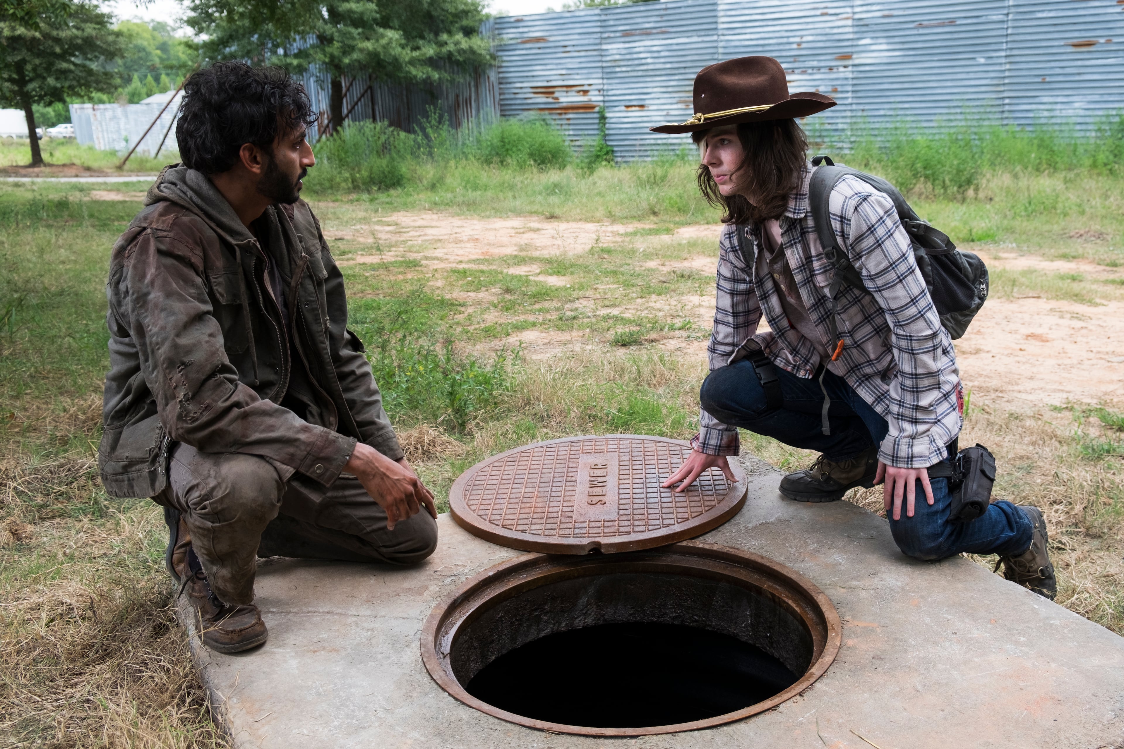 Chandler Riggs as Carl Grimes, Avi Nash as Siddiq - The Walking Dead _ Season 8, Episode 9 - Photo Credit: Gene Page/AMC