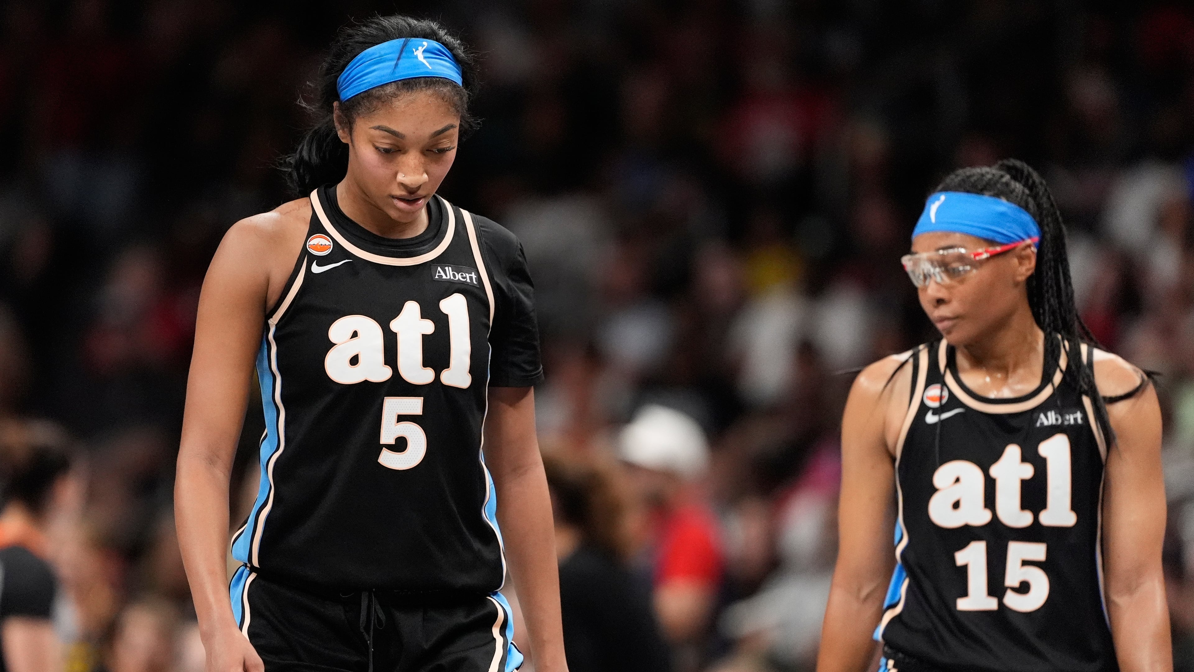 Atlanta Dream forward Angel Reese (5) and guard Allisha Gray (15) react in the second half of an WNBA basketball game Sunday, Aug. 16, 2026, in Atlanta. (AP Photo/Brynn Anderson)