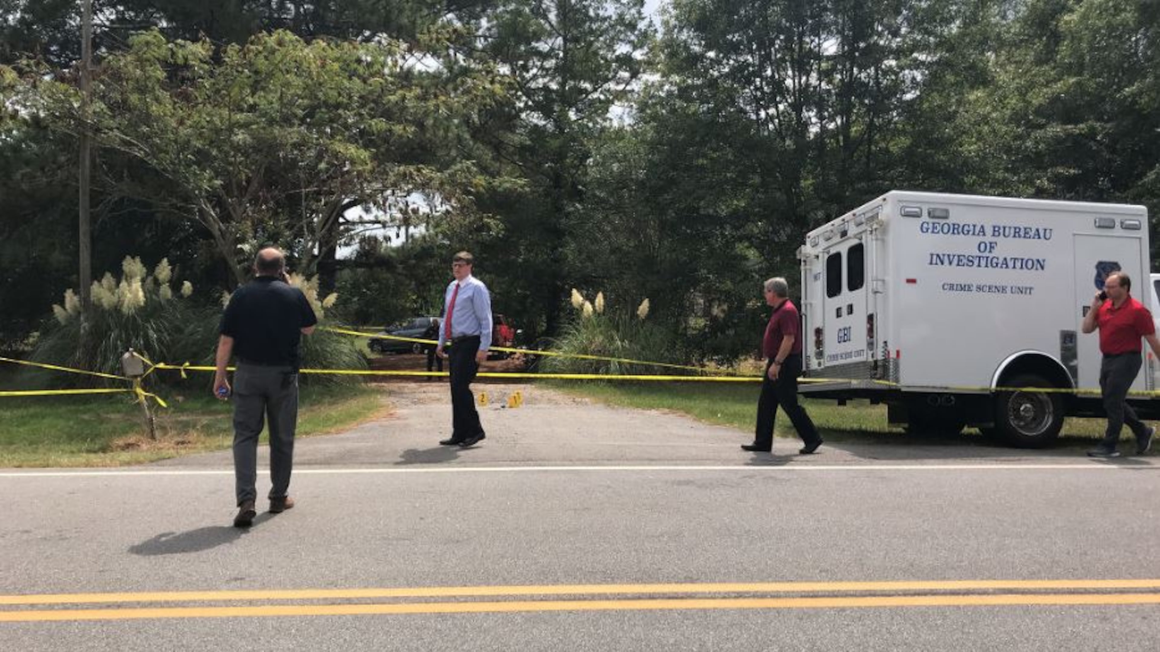 The bodies were found about 9:30 a.m. at a home along Sparta Highway.