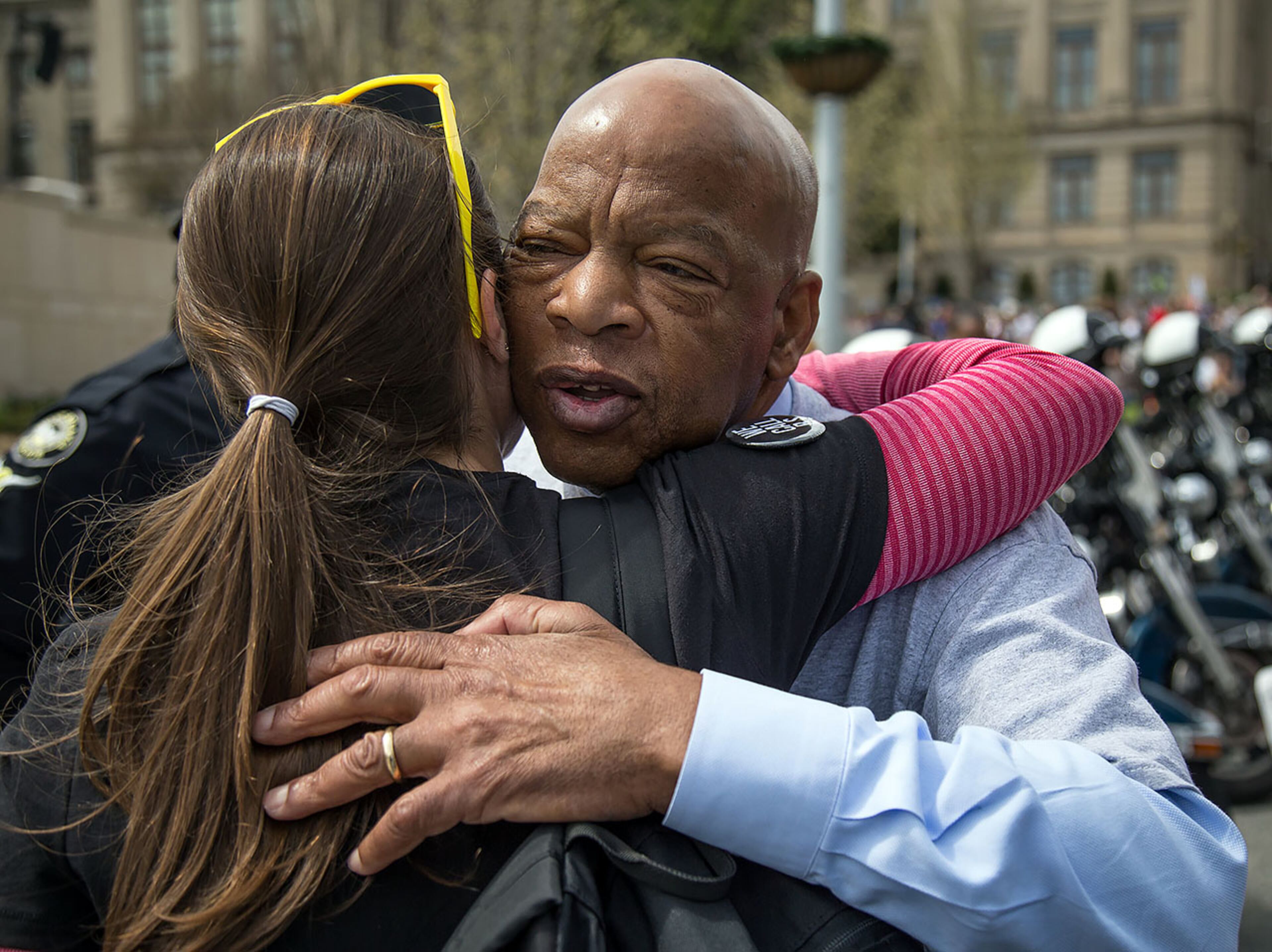 Congressman John Lewis gets a hug from a supporter after Lewis and student organizers led the March For Our Life Atlanta rally to Liberty Plaza Saturday, March 24, 2018. STEVE SCHAEFER / SPECIAL TO THE AJC