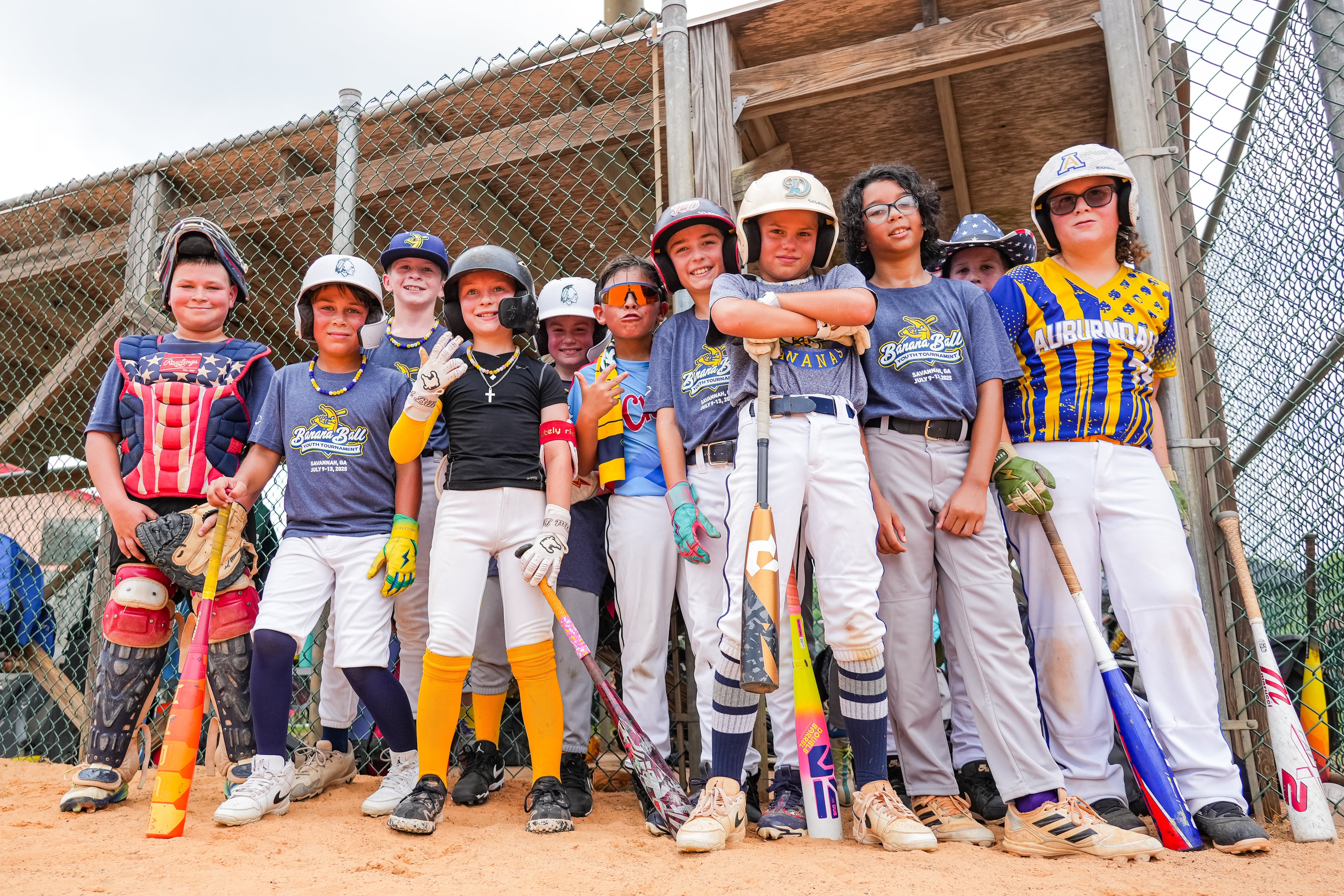 Young baseball players pose ahead of the start of the second annual Banana Ball Youth Tournament in Savannah. (Anna Rouch/Fans First Entertainment)