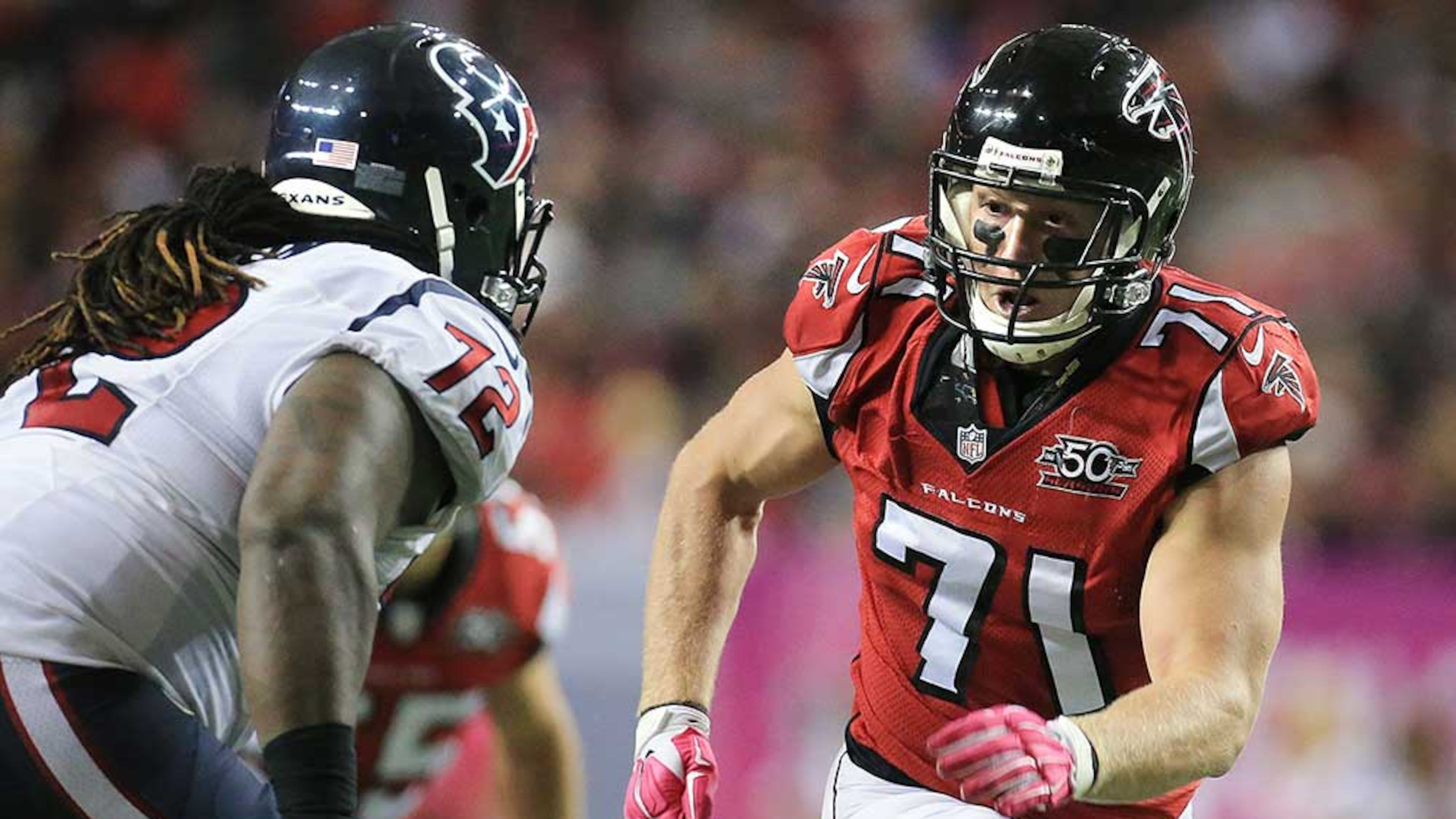 100415 ATLANTA: Falcons Kroy Biermann rushes against Texans Derek Newton in a football game on Sunday, Oct. 4, 2015, in Atlanta. Curtis Compton / ccompton@ajc.com