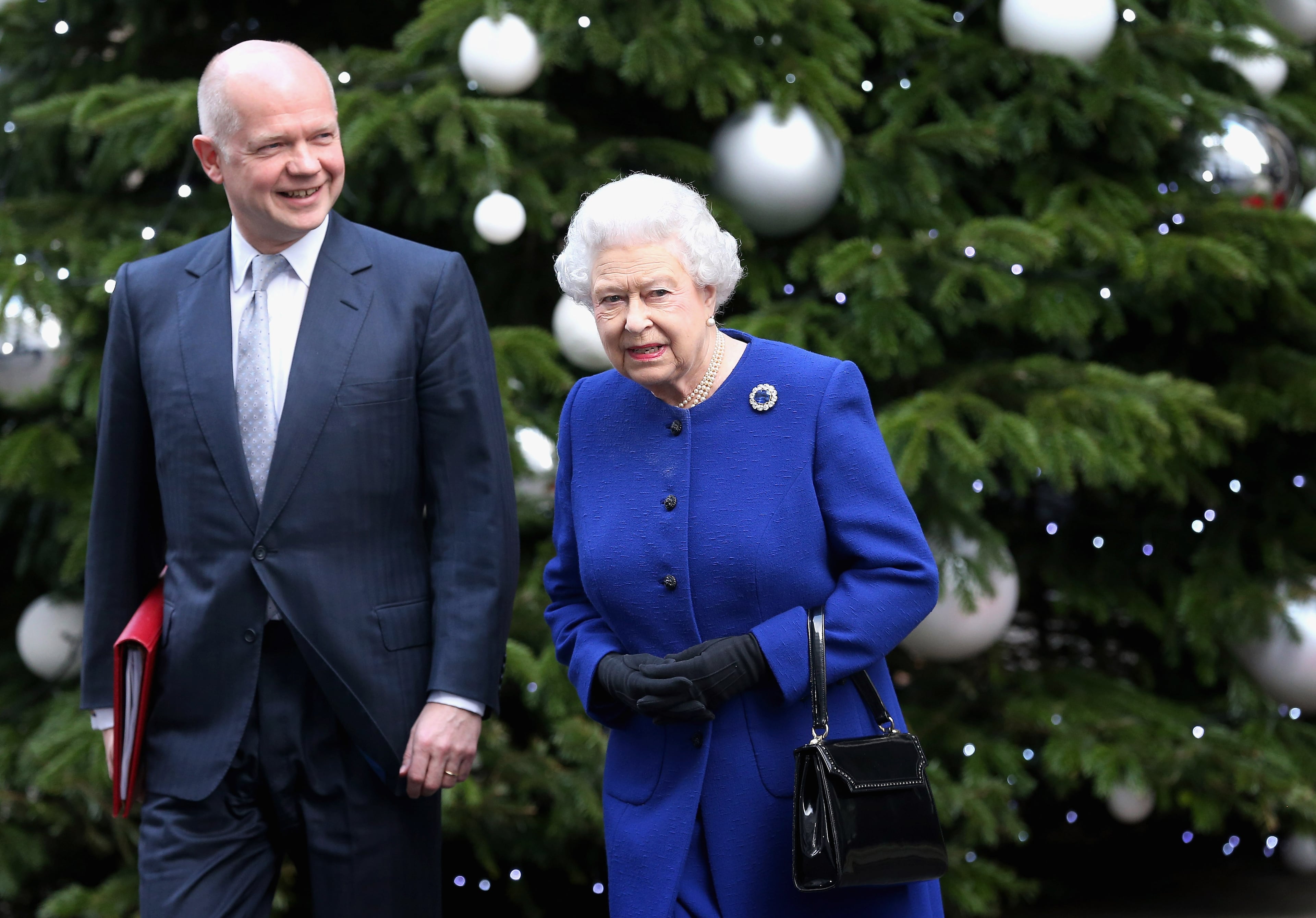 Queen Elizabeth II, accompanied by Foreign Secretary William Hague, leaves Number 10 Downing Street after attending the Government's weekly Cabinet meeting on December 18, 2012 in London, England. (Photo by Chris Jackson/Getty Images)