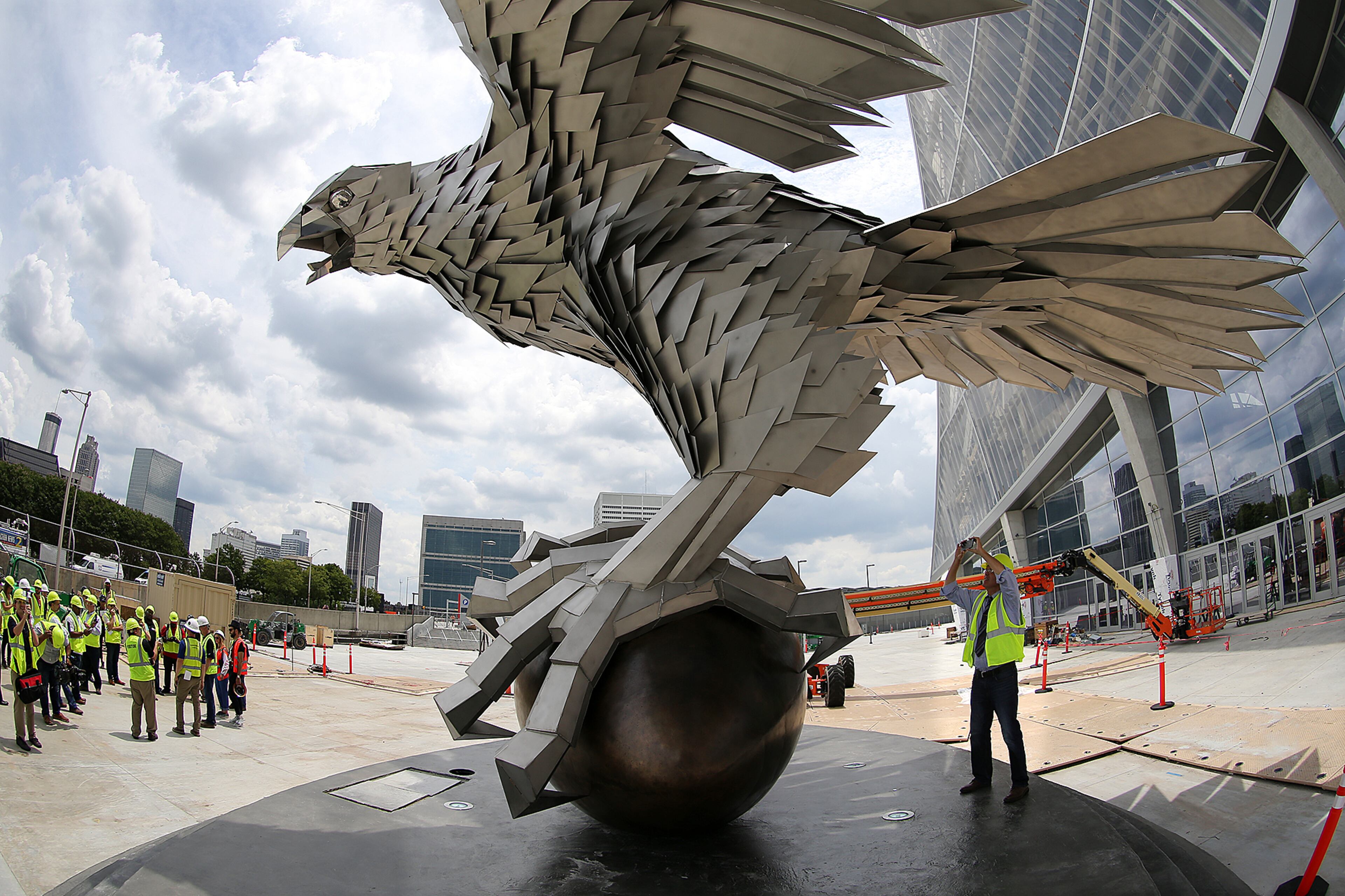 June 1, 2017, Atlanta: Visitors take in the giant falcon sculpture in the Fan Plaza during a tour of Mercedes-Benz Stadium on Thursday, June 1, 2017, in Atlanta. Curtis Compton/ccompton@ajc.com