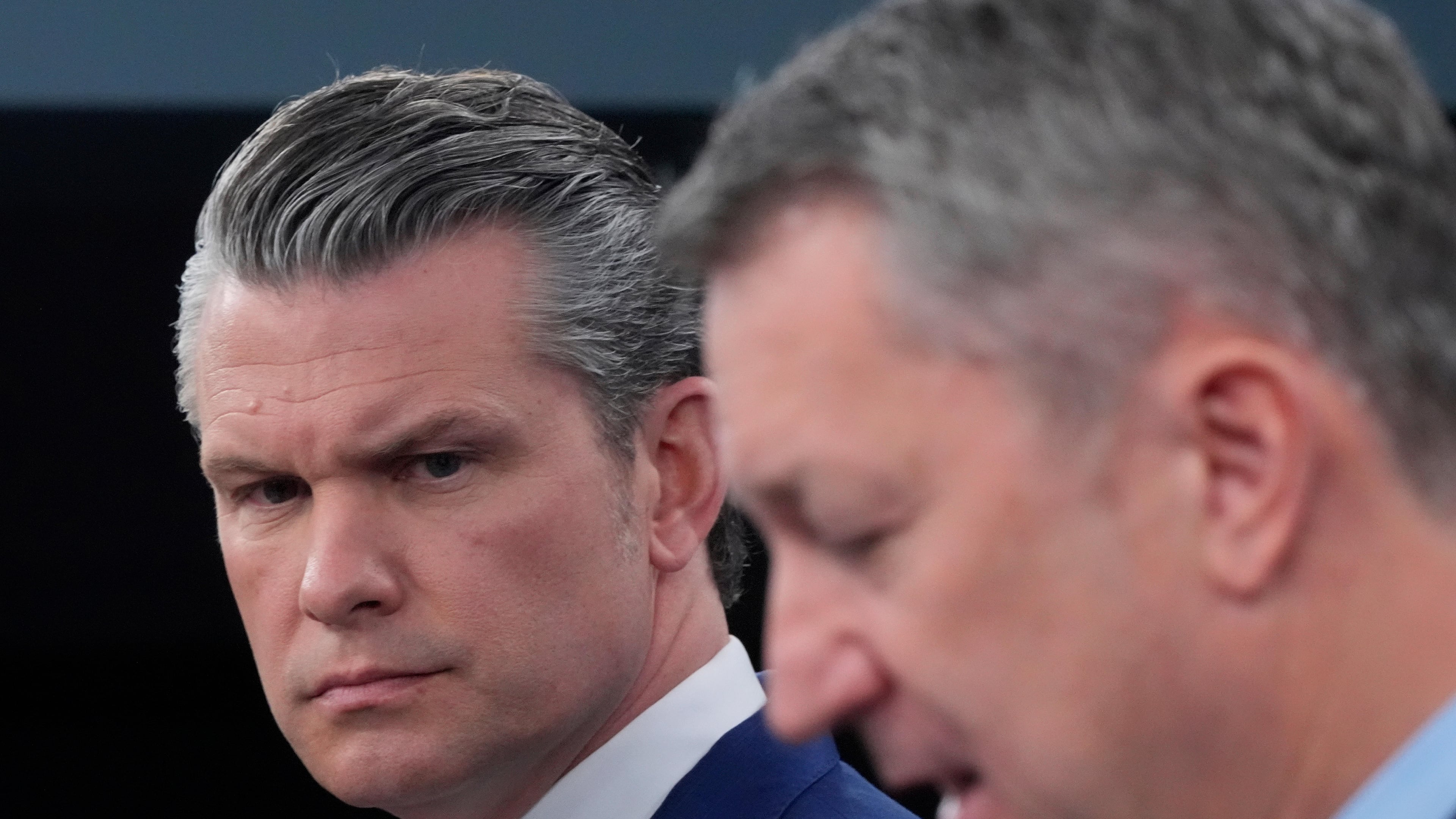 Defense Secretary Pete Hegseth and Chairman of the Joint Chiefs of Staff Gen. Dan Caine speak to members of the media during a press briefing at the Pentagon in Washington, Tuesday, May 5, 2026. (AP Photo/Manuel Balce Ceneta)