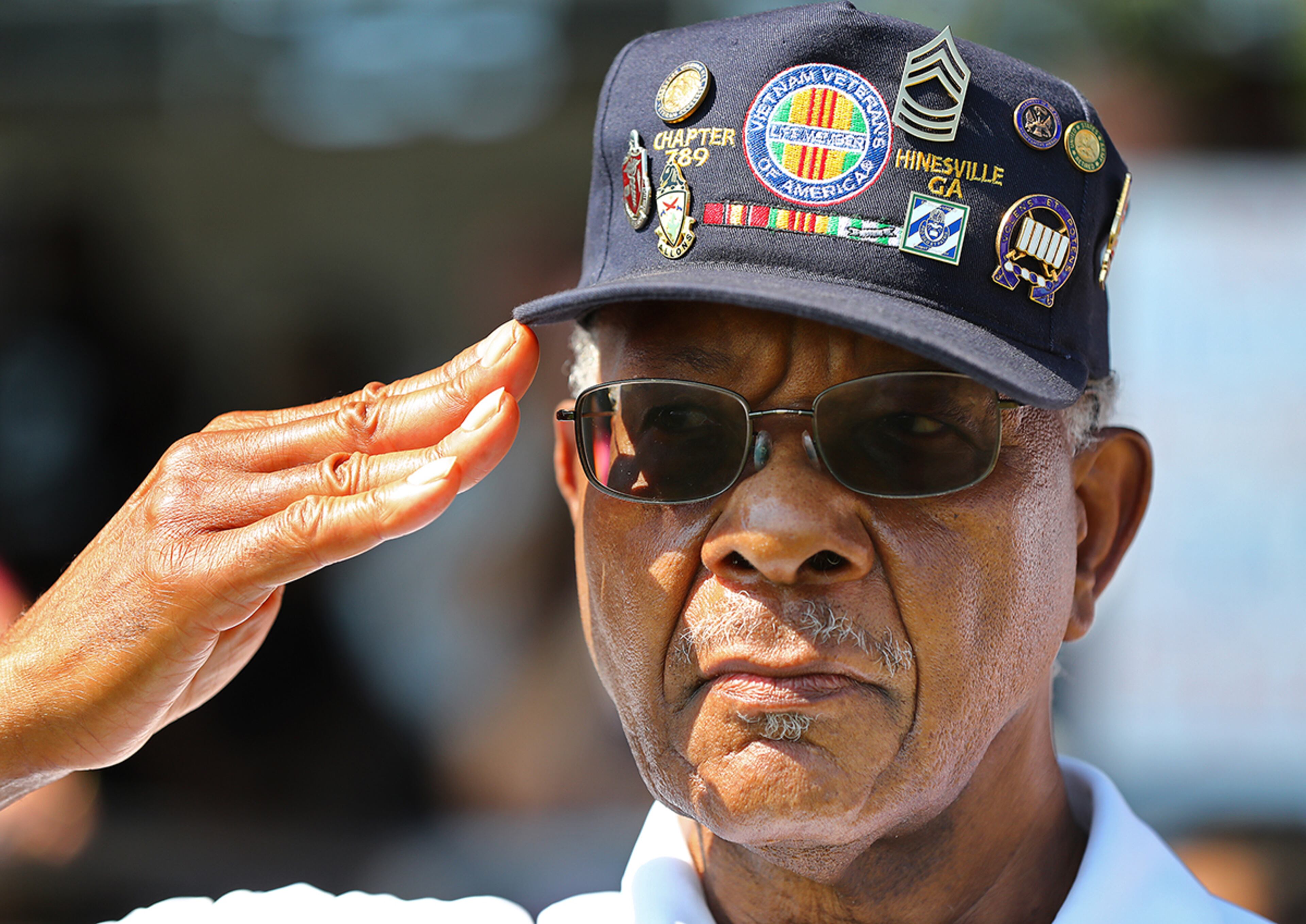 July 30, 2019 Fort Stewart: Vietnam veteran Vasco McRae is on hand to show his support saluting soldiers of the 48th Infantry Brigade Combat Team representing units from across the state as they return home from deployment to Afghanistan in support of Operation Resolute Support at Cottrell Field on Tuesday, July 30, 2019, in Fort Stewart. Curtis Compton/ccompton@ajc.com