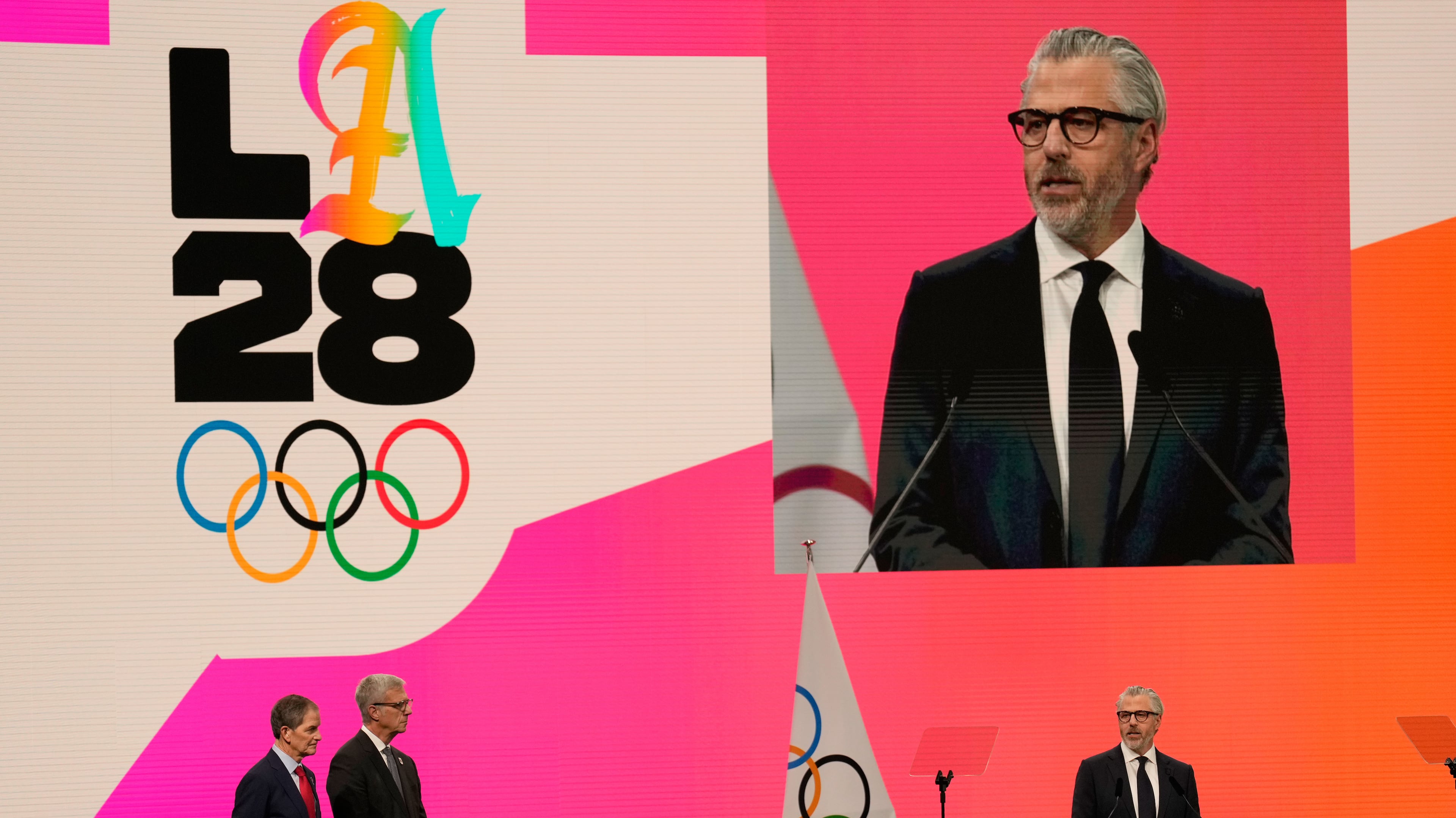 Casey Wasserman, Chairman of the Los Angeles Organizing Committee for the 2028 Olympic and Paralympic Games speaks during an IOC meeting ahead of the 2026 Winter Olympics, in Milan, Italy, Tuesday, Feb. 3, 2026. (AP Photo/Luca Bruno)