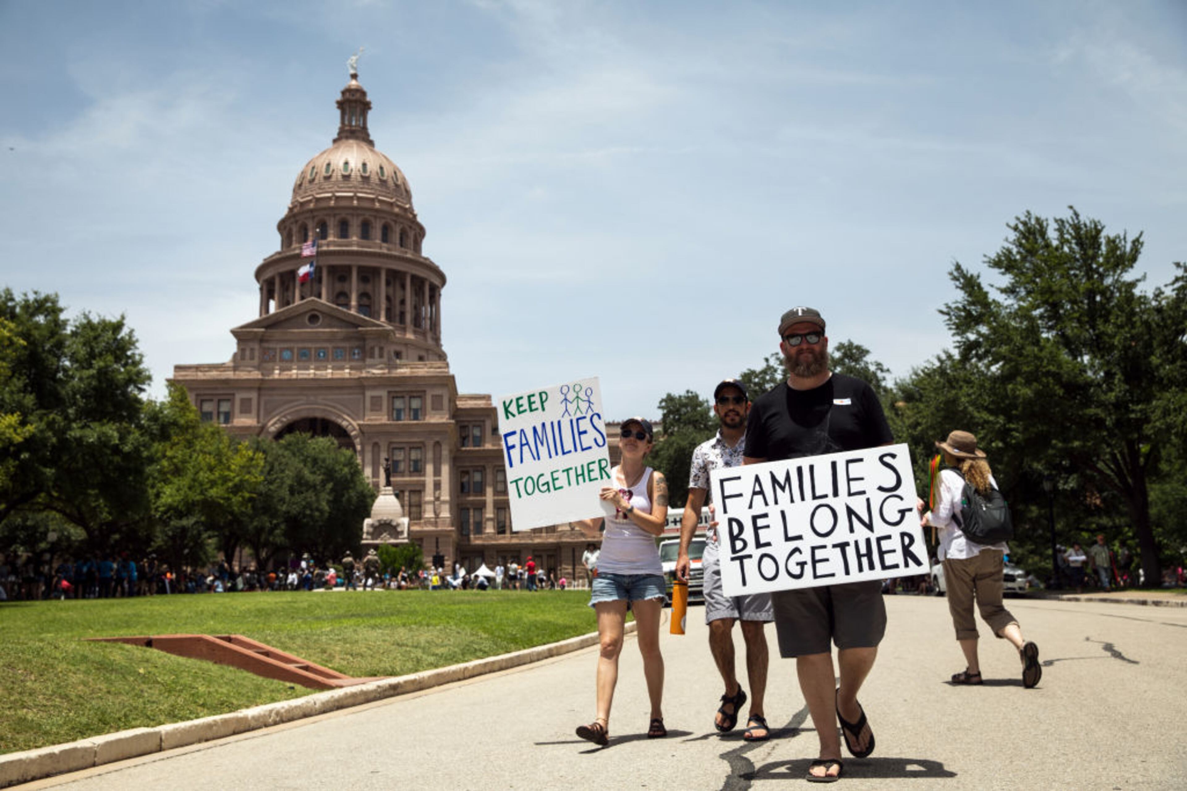 AUSTIN, TX - JUNE 30: Demonstrators rally against the Trump administration's immigration policies outside of the Texas Capitol in Austin, Texas, on June 30, 2018. Demonstrations are being held in cities across the U.S. Saturday to call for the reunification of separated families and to protest the detention of children and families seeking asylum at the border. (Photo by Tamir Kalifa/Getty Images)