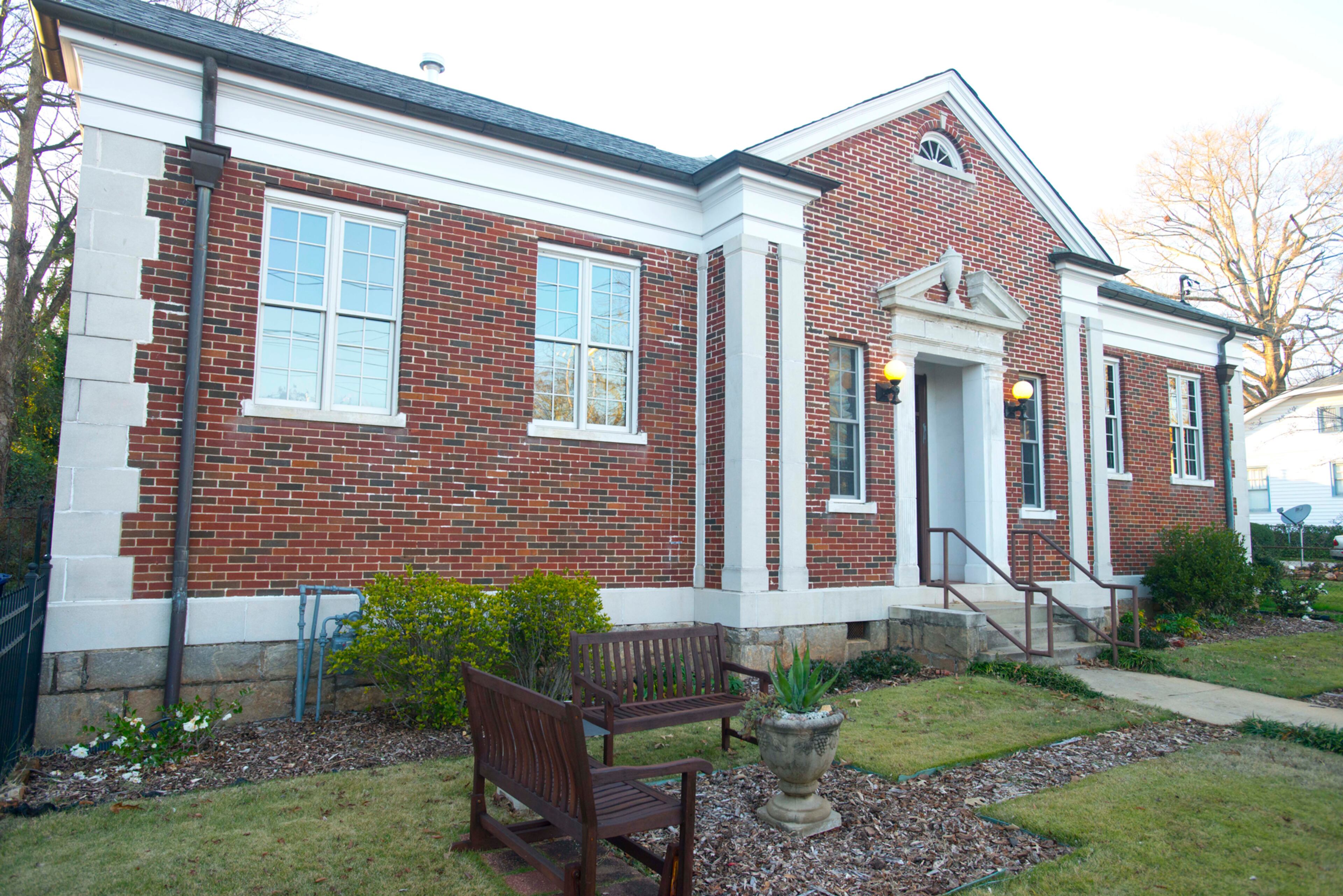 The structure in Atlanta’s Kirkwood community was built in the 1940s by funds donated by philanthropist Andrew Carnegie as one of the Carnegie libraries in Atlanta and nationally. Brazee and Huff bought the six-room property from the Atlanta-Fulton County Public Library System, which closed the library in 1995.