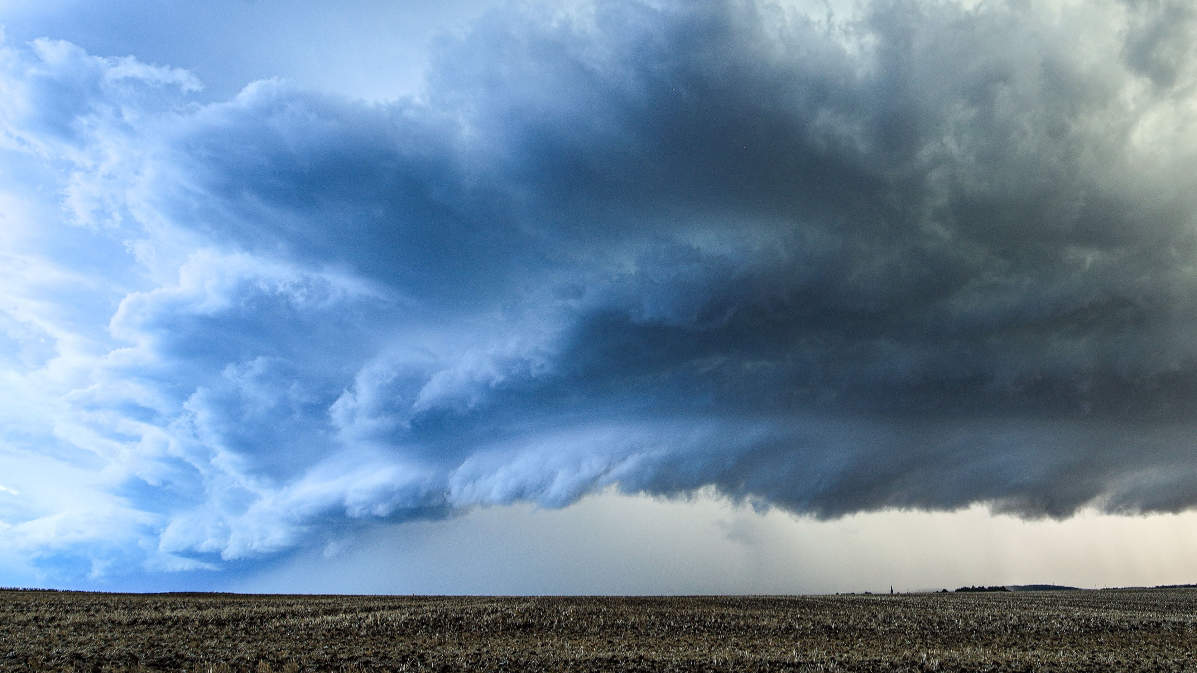 A thundercloud is moving over Lich in the Giessen district of central Hesse, Germany, Wednesday, Aug. 19, 2026. (Alexander Wolf/onw-images/dpa via AP)