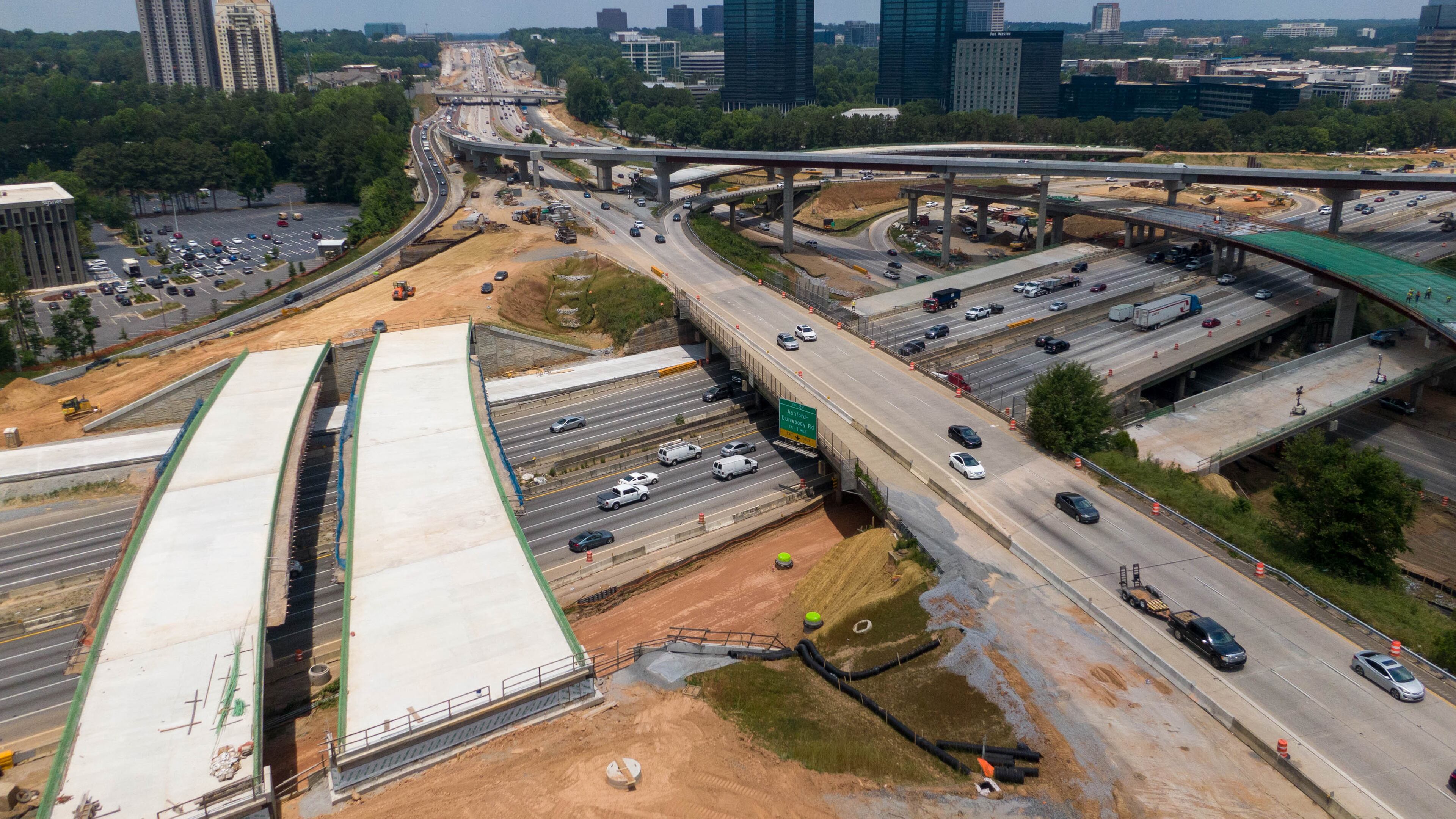 May 27, 2021 Sandy Springs - Aerial photo shows construction site of I-285 interchange at Ga. 400 in Sandy Springs on Tuesday, May 27, 2021. (Hyosub Shin / Hyosub.Shin@ajc.com)