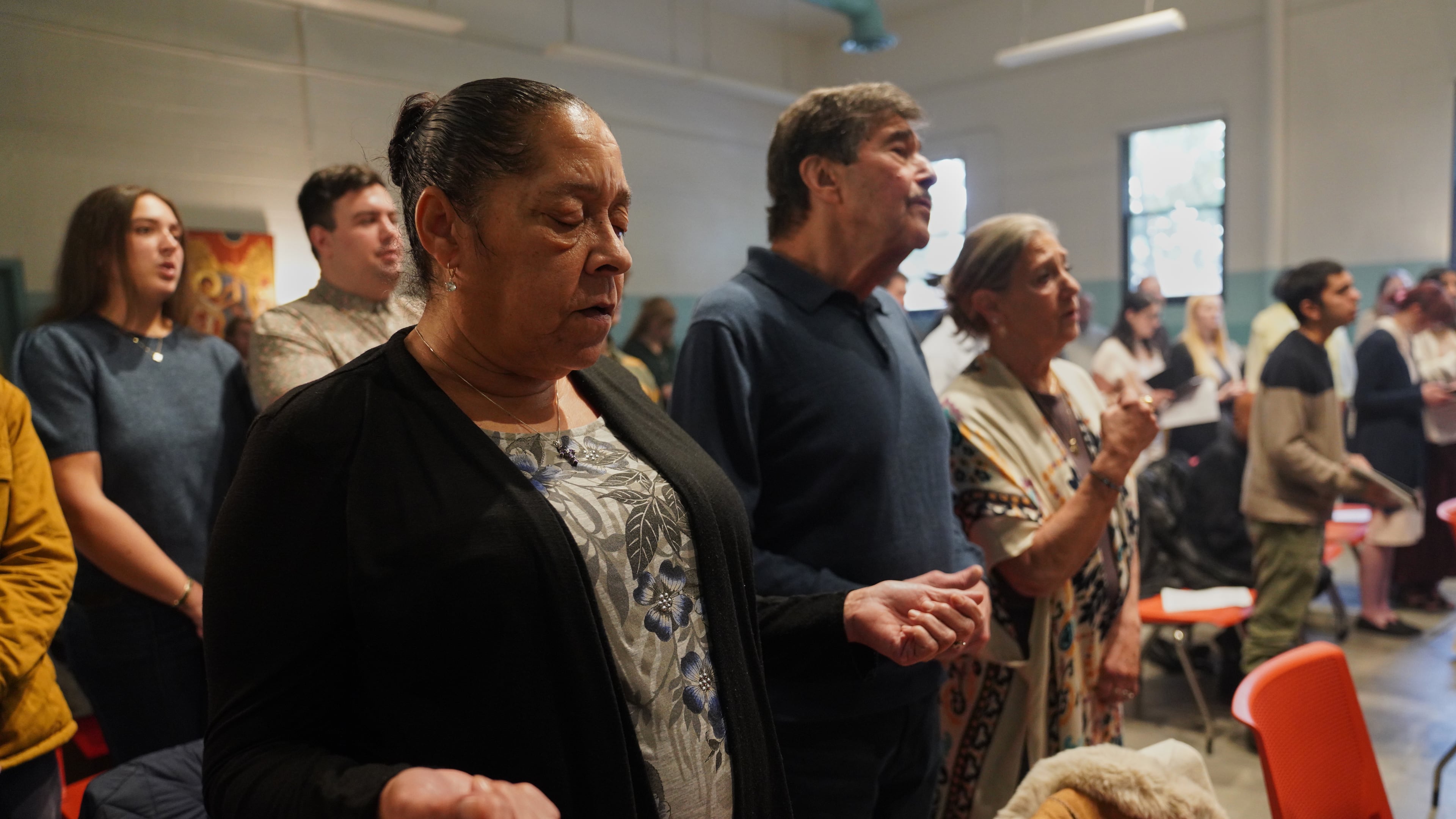 FILE - Members of St. Moses the Black Orthodox Church worship together during service on Nov. 9, 2025, in Pittsburgh. (AP Photo/Jessie Wardarski, File)
