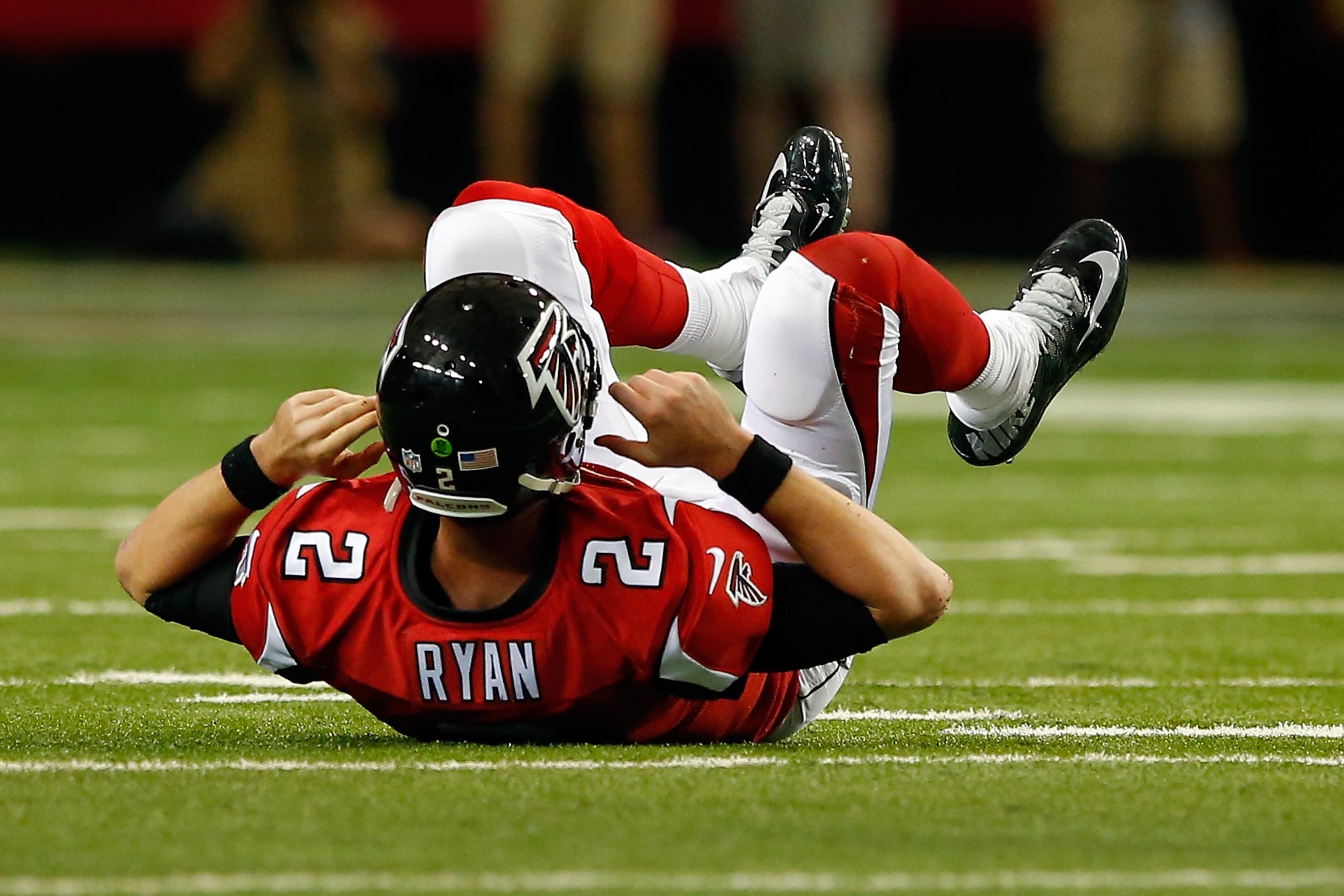 ATLANTA, GA - NOVEMBER 29: Matt Ryan #2 of the Atlanta Falcons reacts to taking a hit during the second half against the Minnesota Vikings at the Georgia Dome on November 29, 2015 in Atlanta, Georgia. (Photo by Kevin C. Cox/Getty Images)