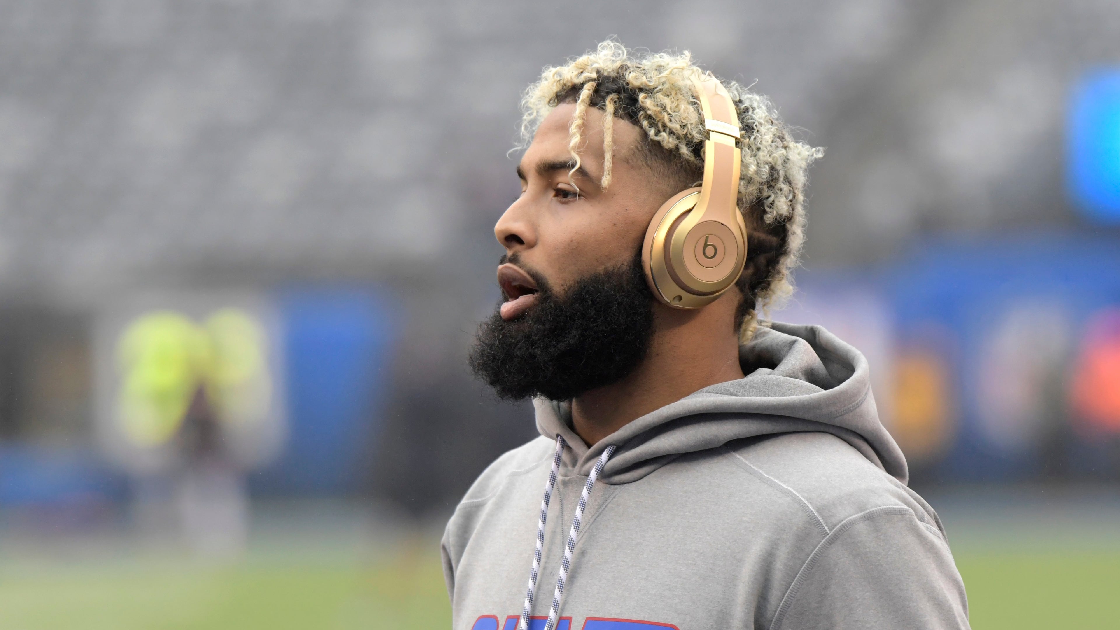 FILE - New York Giants wide receiver Odell Beckham warms up prior to an NFL football game against the Chicago Bears, Dec. 2, 2018, in East Rutherford, N.J. (AP Photo/Bill Kostroun, file)