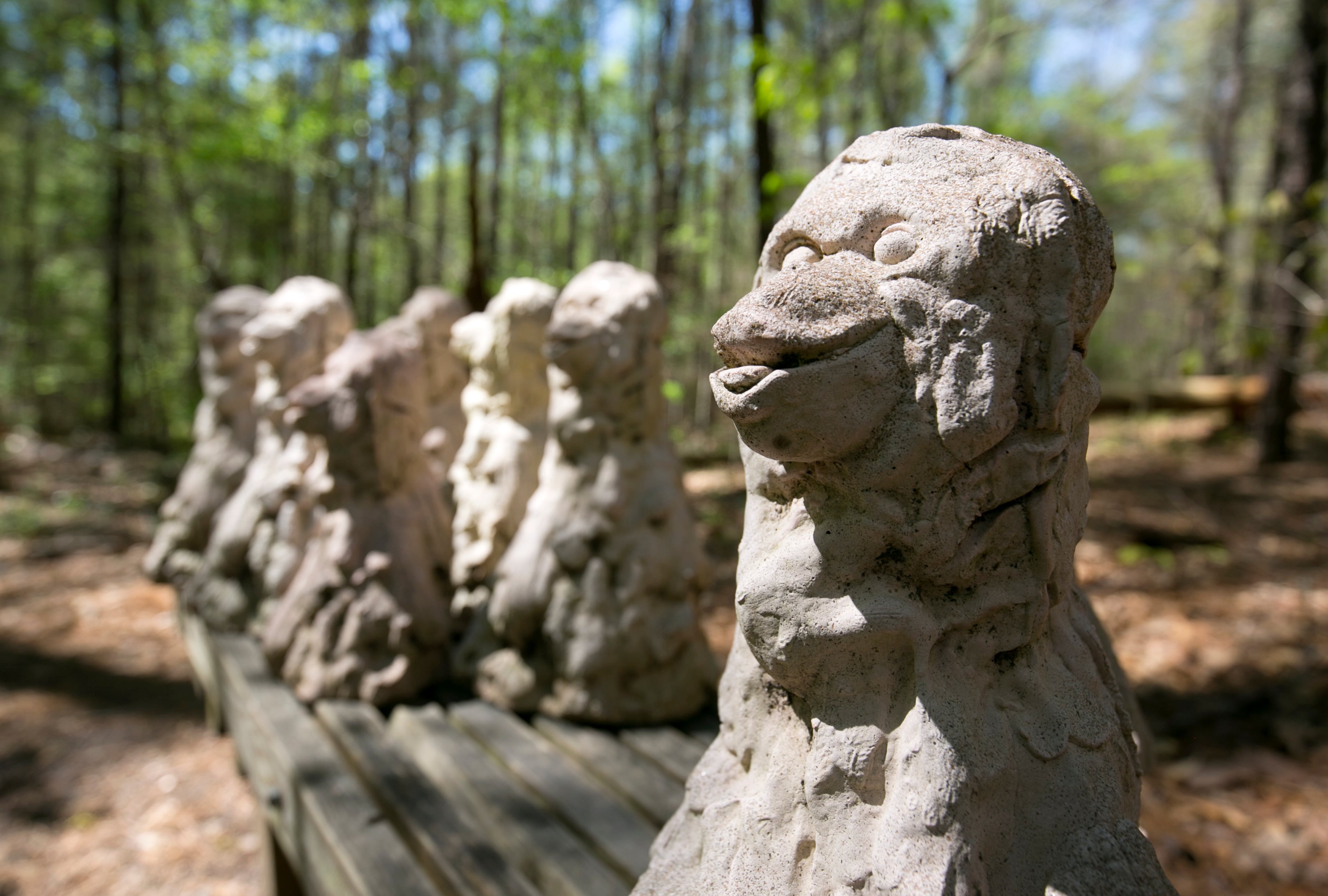 April 2, 2016 - Johns Creek, Ga: Concrete monkeys are shown on the Autrey Mill's trail at the Autrey Mill Nature Preserve and Heritage Center Saturday, April 2, 2016, in Johns Creek, Ga. This is for the insider's guide feature about the Newtown neighborhood. PHOTO / JASON GETZ