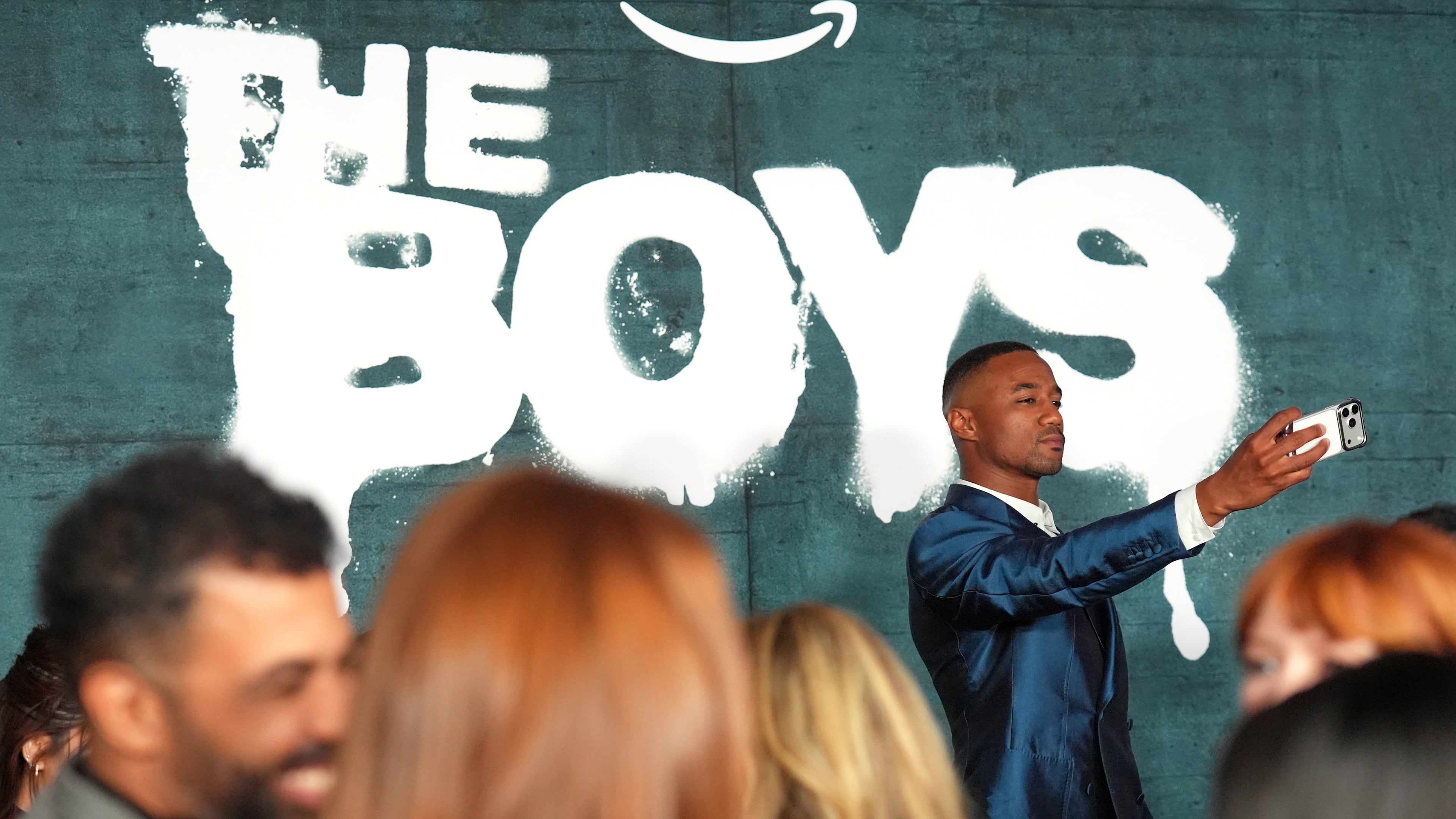 Actor Jessie T. Usher shoots a selfie at the premiere of the series finale of the fifth season of the Amazon Prime Video series "The Boys" on Tuesday, May 19, 2026, in Los Angeles. (AP Photo/Chris Pizzello)