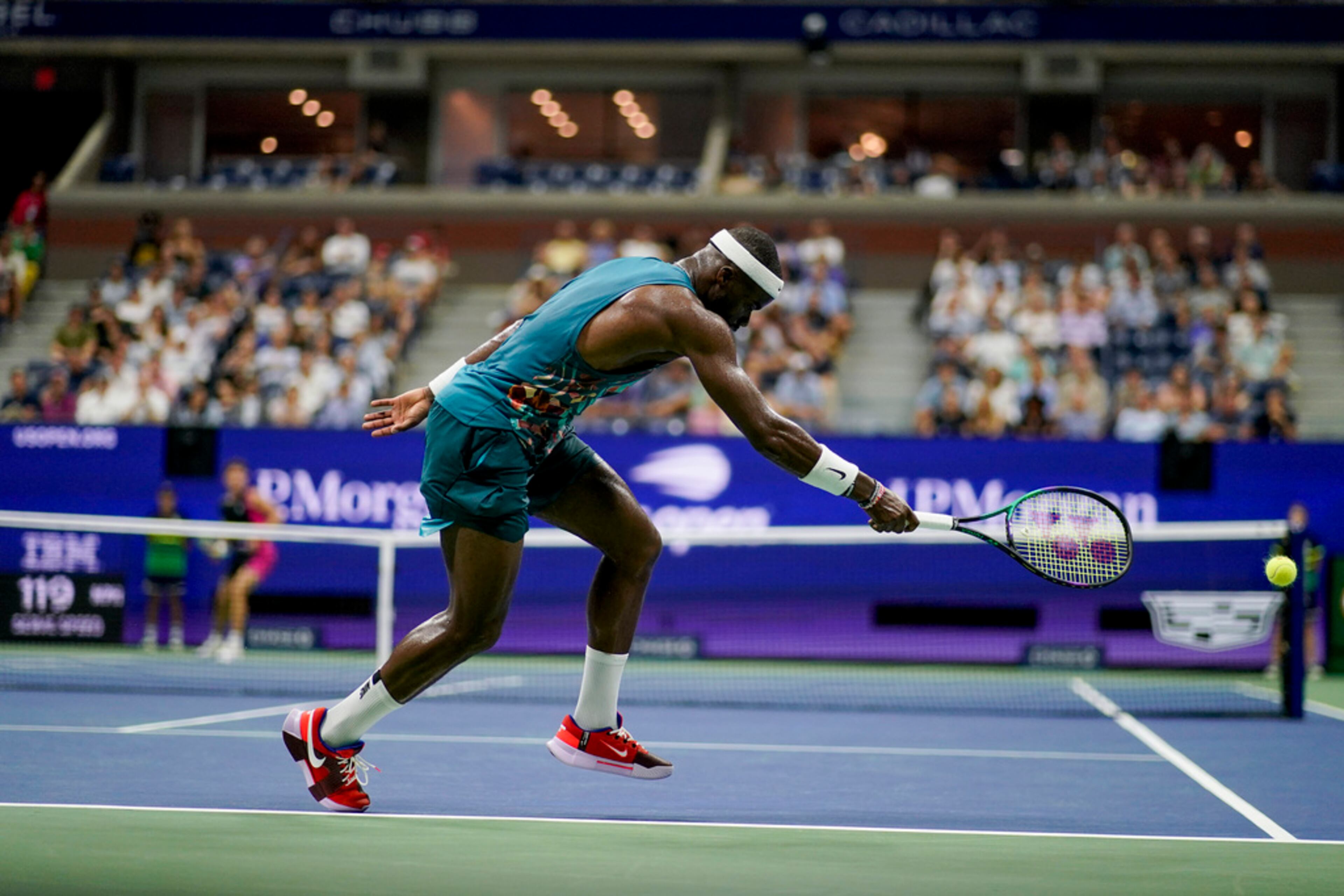 Frances Tiafoe, of the United States, can't make a return on a shot from Ben Shelton, of the United States, during the quarterfinals of the U.S. Open tennis championships, Tuesday, Sept. 5, 2023, in New York. (AP Photo/Eduardo Munoz Alvarez)