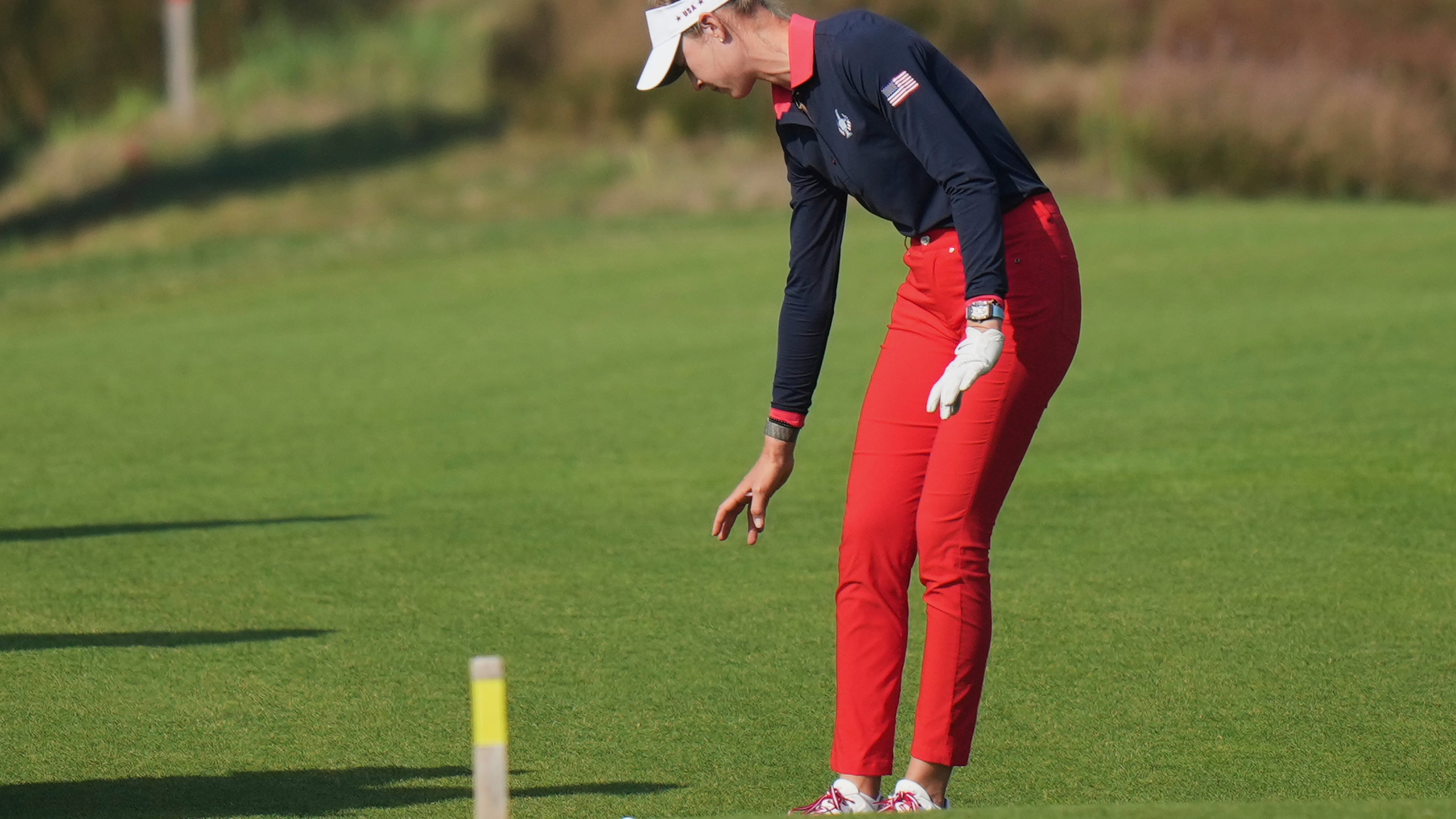Nelly Korda of the United States takes a drop on the 16th fairwayduring the Solheim Cup at the Bernardus Golf course in Den Bosch, Netherlands, Saturday, Sept. 12, 2026. (AP Photo/Alastair Grant)