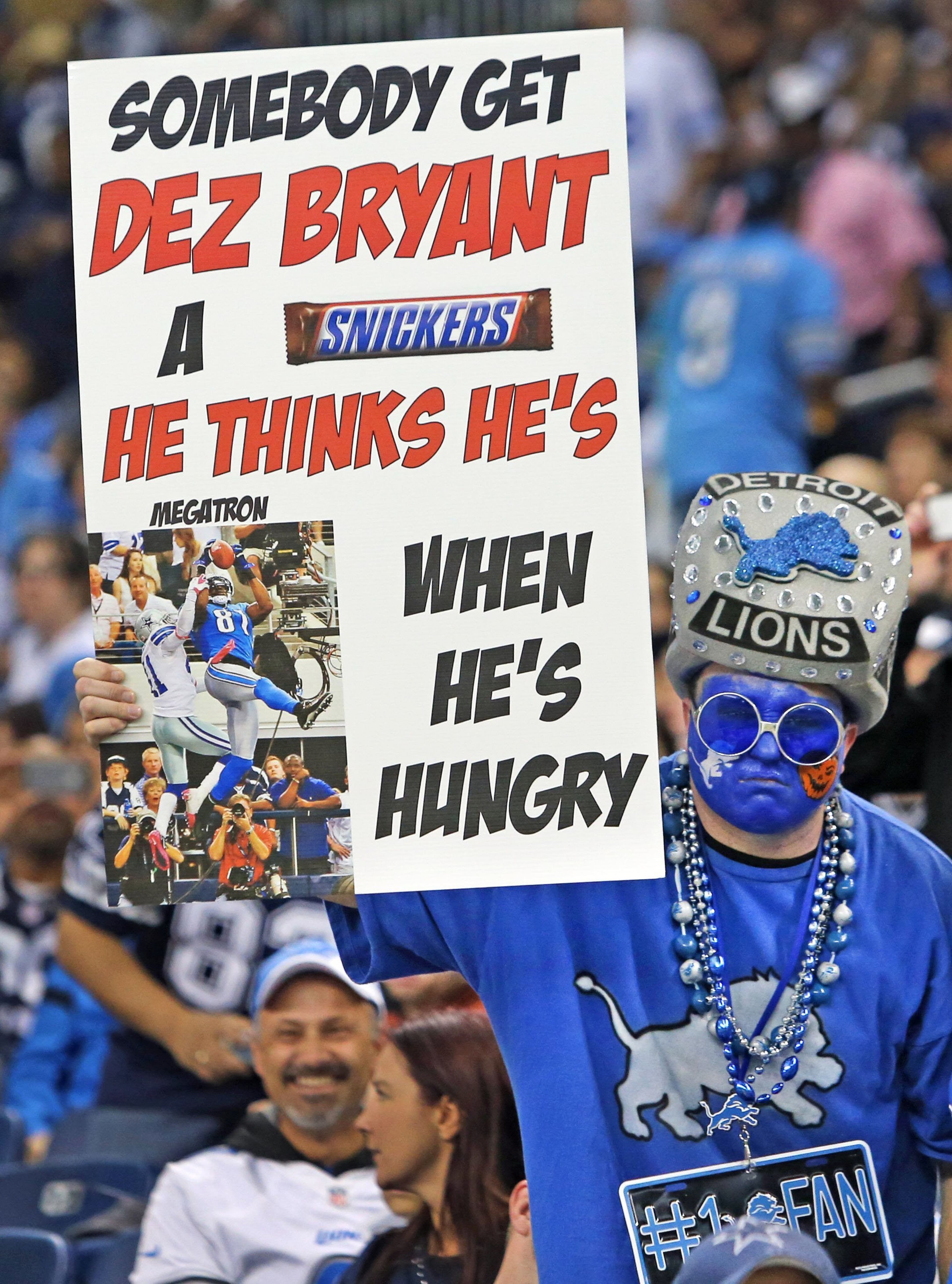 A Lions fan holds a sign for Dallas Cowboys WR Dez Bryant at Ford Field in Detroit. Prior to the game, Bryant said he is equally as good as Detroit's Calvin Johnson. The Detroit Lions beat the Dallas Cowboys 31-30 in a classic. (Louis DeLuca/Dallas Morning News/MCT)