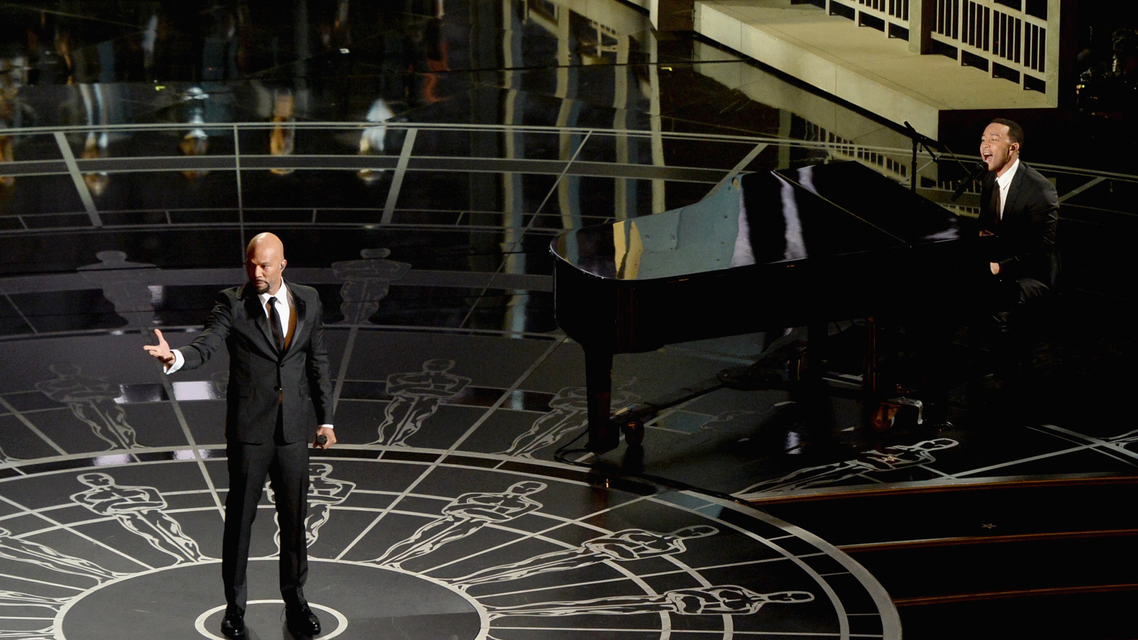 onstage during the 87th Annual Academy Awards at Dolby Theatre on February 22, 2015 in Hollywood, California. Lady G says hello to Julie Andrews. Photo: Getty Images.
