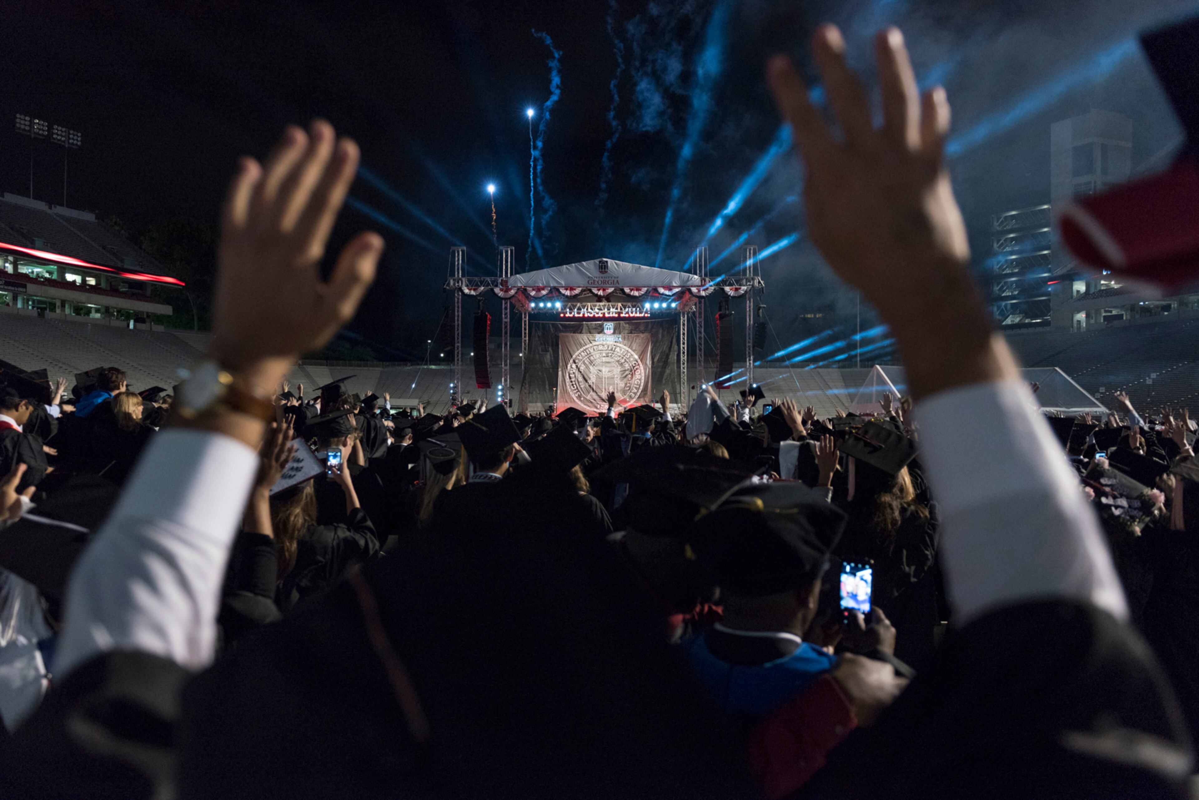 May 5, 2017, Athens - Students call the dawgs during a fireworks show during the University of Georgia's undergraduate commencement ceremony at Sanford Stadium in Athens, Georgia, on Friday, May 5, 2017. (DAVID BARNES / DAVID.BARNES@AJC.COM)