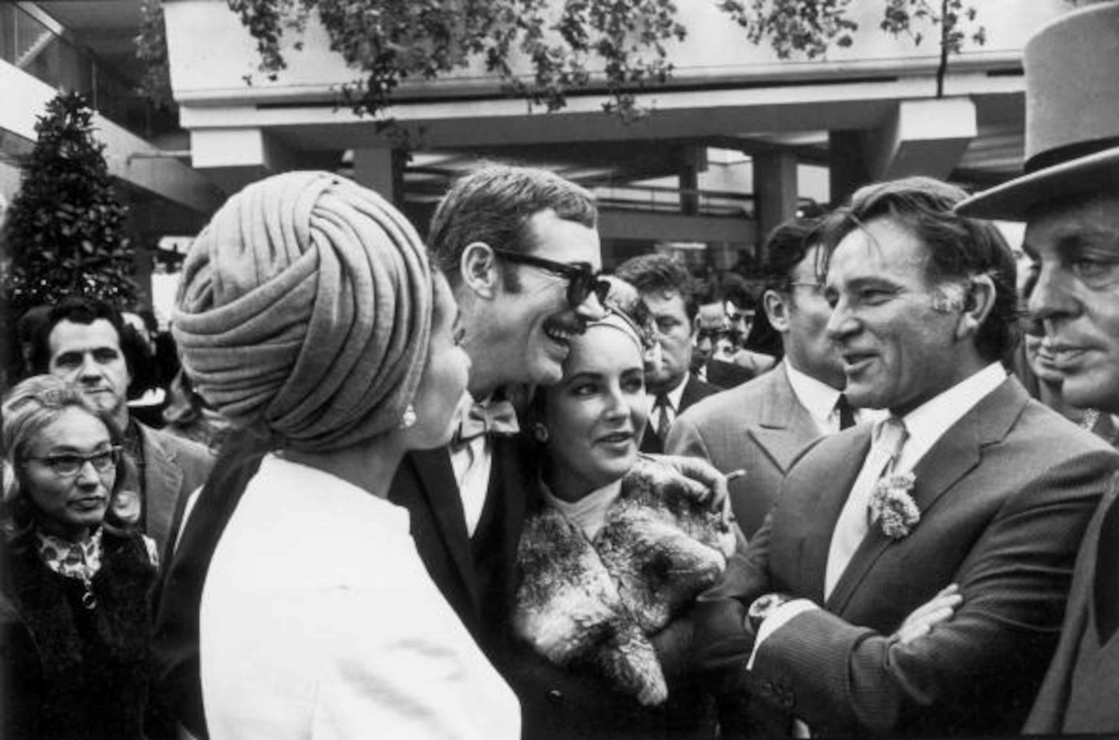From left to right, opera singer Maria Callas (1923 - 1977) with actors Peter O'Toole, Elizabeth Taylor and Richard Burton (1925 - 1984) at a race meeting in Longchamp, Paris. (Photo by Reg Lancaster/Express/Getty Images)
