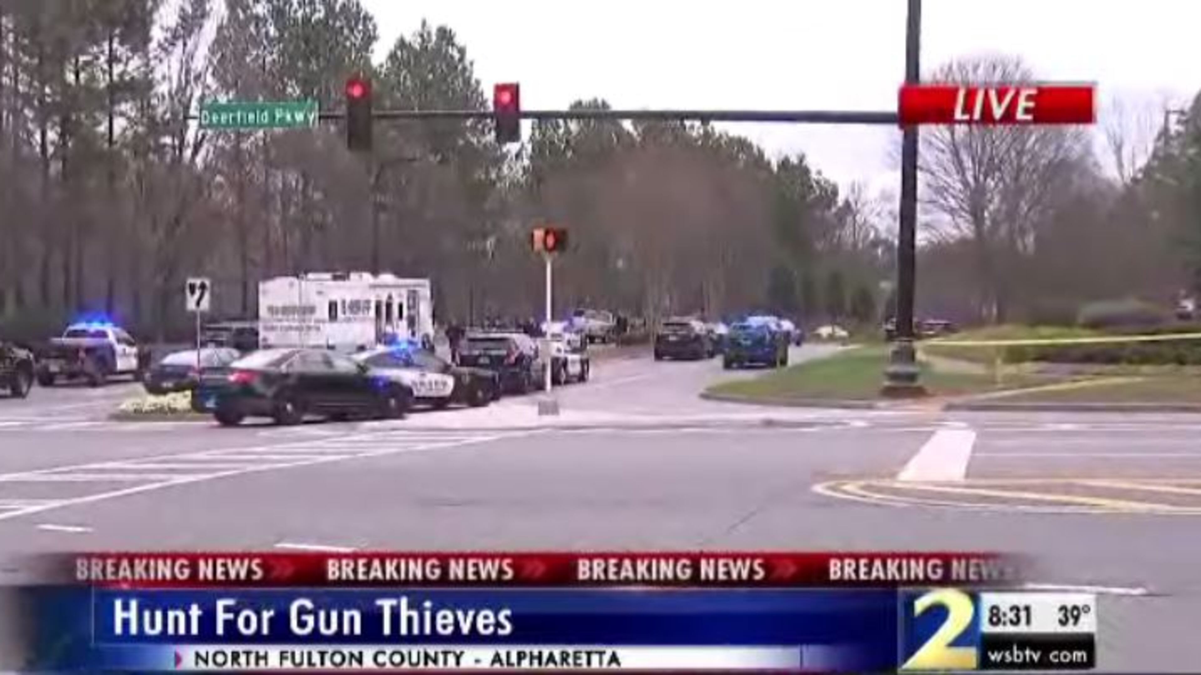 Authorities had some suspects in custody and were seeking others in connection with gun thefts from a Forsyth County pawn shop. (Credit: Channel 2 Action News)