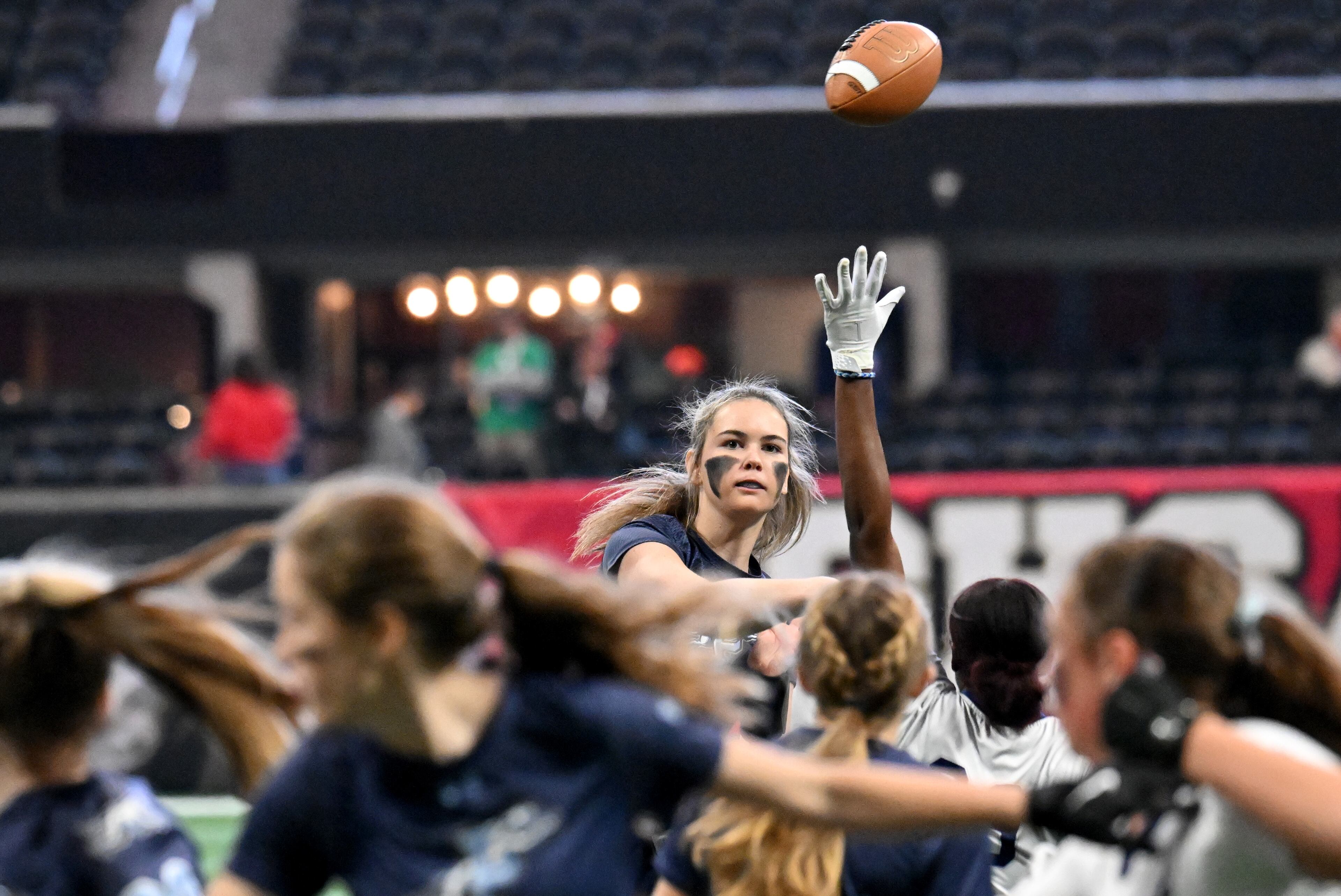 Pope’s Abbey Bensman (2) gets off a pass during the first half in 2024 GHSA Division 3 Flag Football Championship game at Mercedes-Benz Stadium, Tuesday, December 17, 2024, in Atlanta. Pope won 19-6 over Pace Academy. (Hyosub Shin / AJC)