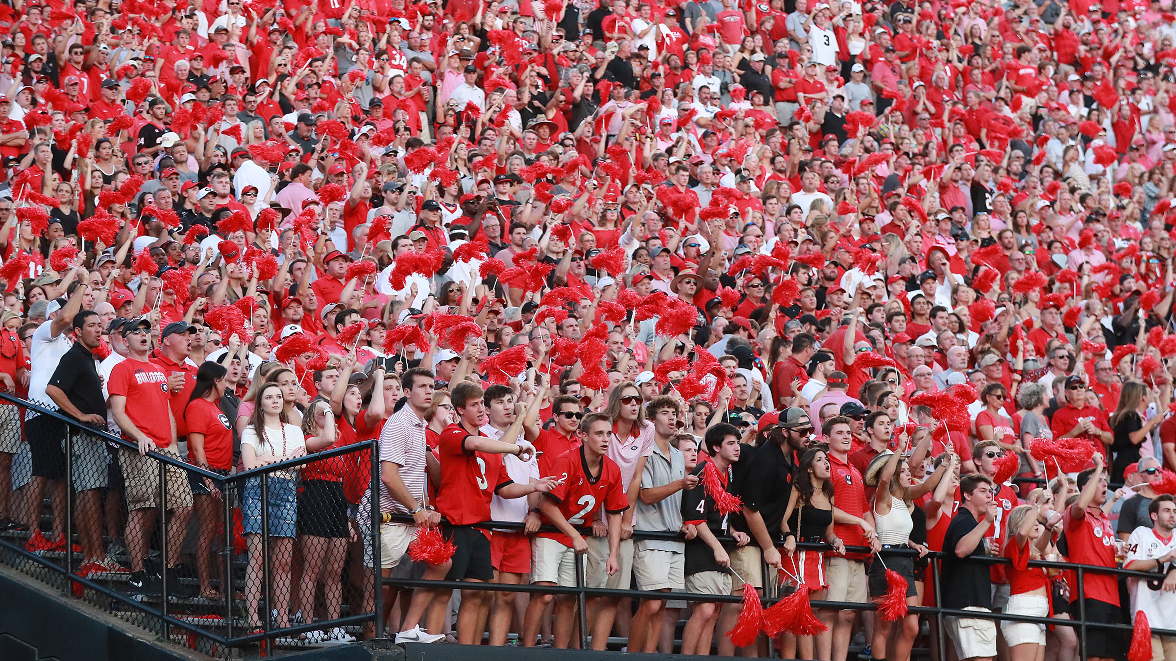 August 31, 2019 Nashville: Georgia fans look on and celebrate a second touchdown for a 14-0 lead over Vanderbilt during the first quarter in a NCAA college football game on Saturday, August 31, 2019, in Nashville. Curtis Compton/ccompton@ajc.com