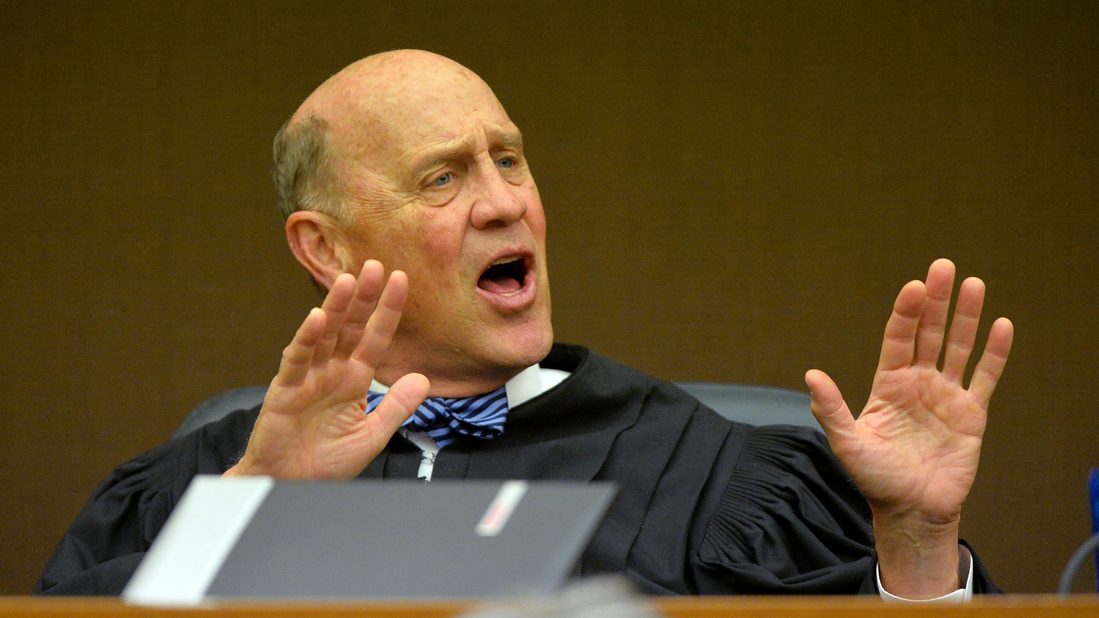 Fulton County Superior Court Judge Jerry Baxter denies motions by defense attorneys Hurl Taylor and Gerald Griggs to allow tribunal transcripts for their clients former APS Usher Collier Heights Elem testing coordinator Donald Bullock and former APS Dobbs Elementary teacher Angela Williamson into the court record Thursday morning. KENT D. JOHNSON / KDJOHNSON@AJC.COM