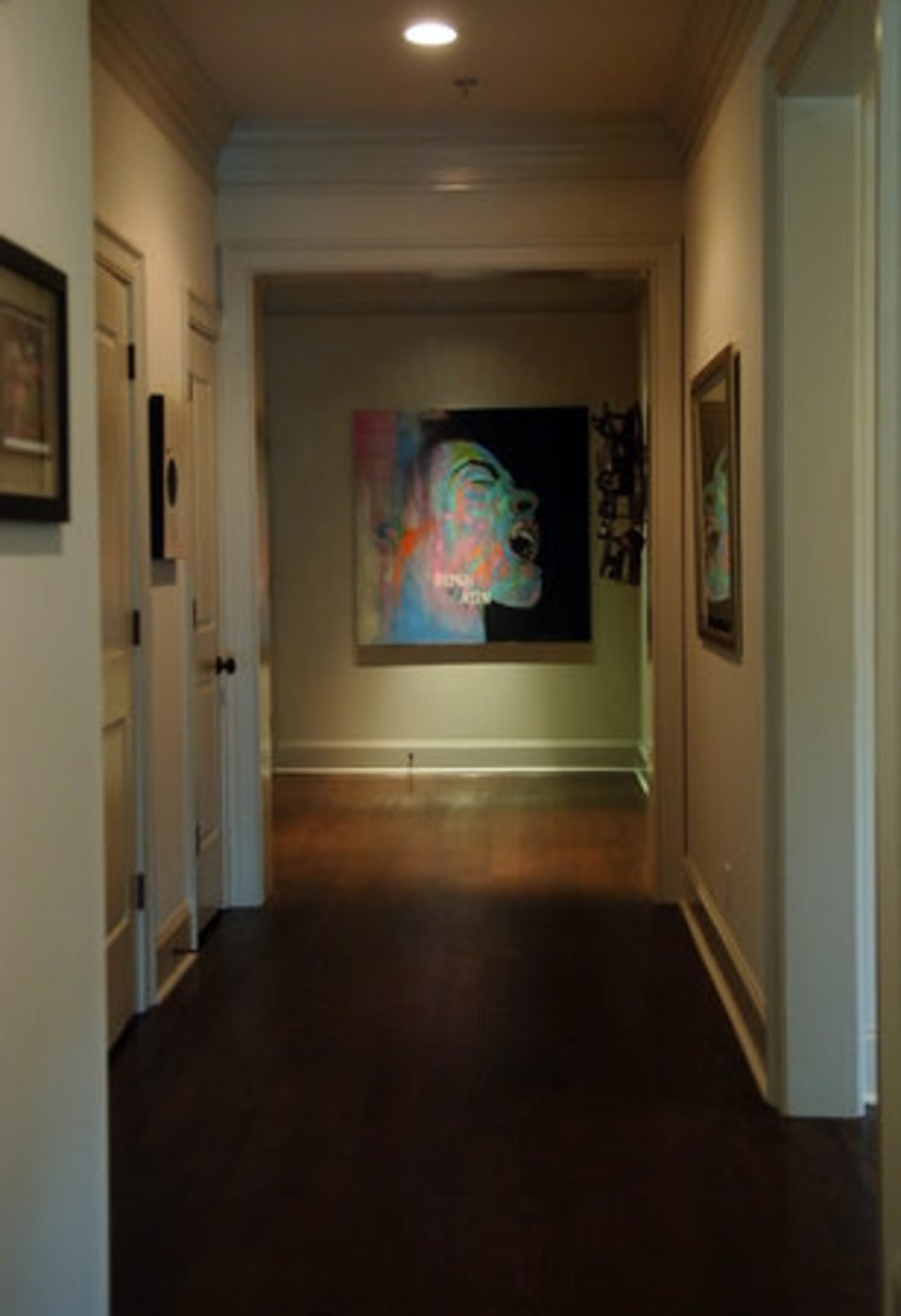 Kansas commissioned the Billie Holliday portrait from local artist Jon Bader in 2002. Bader kept a studio in a building that Kansas owns and bartered some artwork for rent.