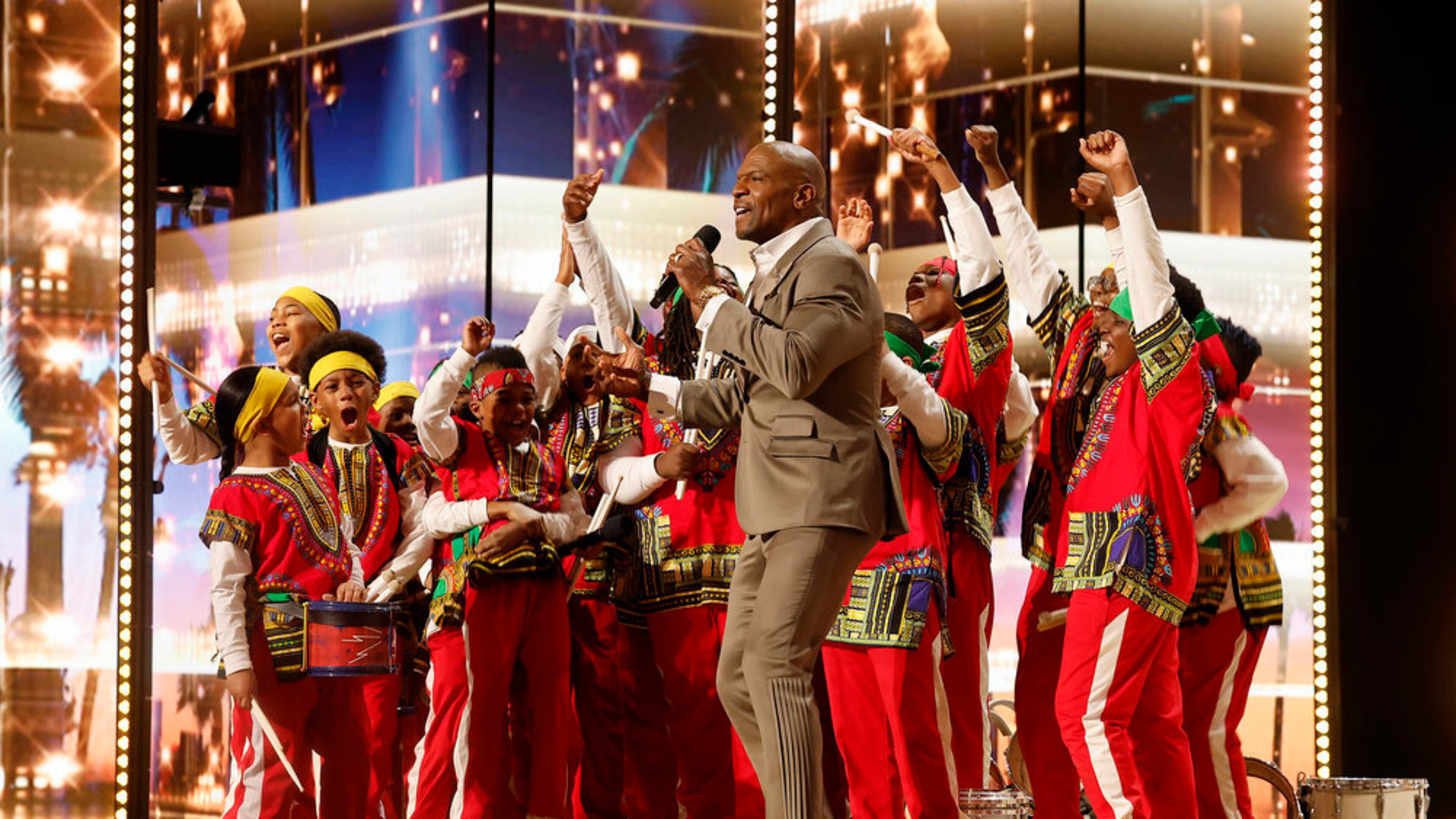 Golden confetti litters the floor at the Pasadena studio where the Atlanta Drum Academy aced their first appearance on "America's Got Talent" last spring. Host Terry Crews awarded the young percussionists the Golden Buzzer, allowing them to move to the next level of competition. The group returns to California for the semi-final competition at the end of August. Courtesy of NBC
