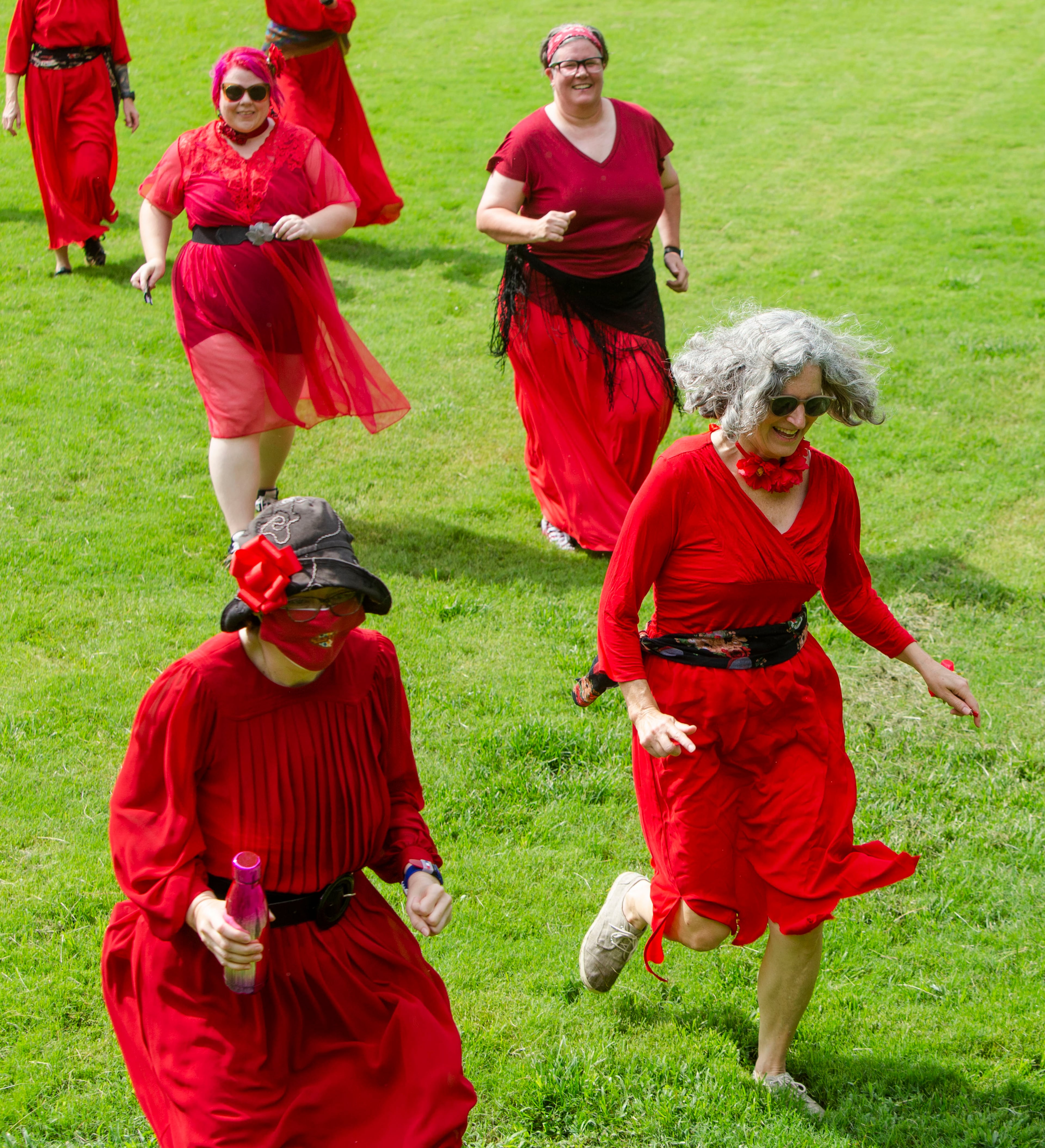 Kate Bush fans "running up that hill" after a group dance performance to celebrate the seventh annual international "Most Wuthering Heights Day Ever," on Saturday, July 30, 2022, in Candler Park in Atlanta. The event celebrates Kate Bush's 1978 song "Wuthering Heights" with events in more than 40 cities around the world. CHRISTINA MATACOTTA FOR THE ATLANTA JOURNAL-CONSTITUTION