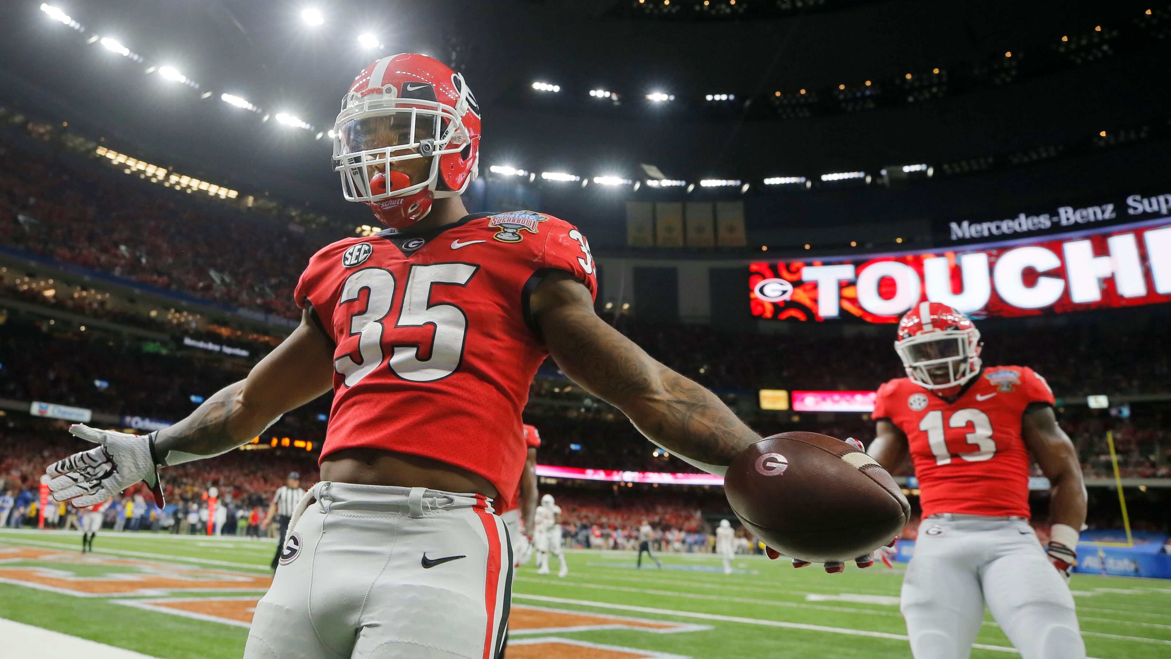 Georgia Bulldogs running back Brian Herrien (35) celebrates scoring a touchdown. BOB ANDRES / bandres@ajc.com