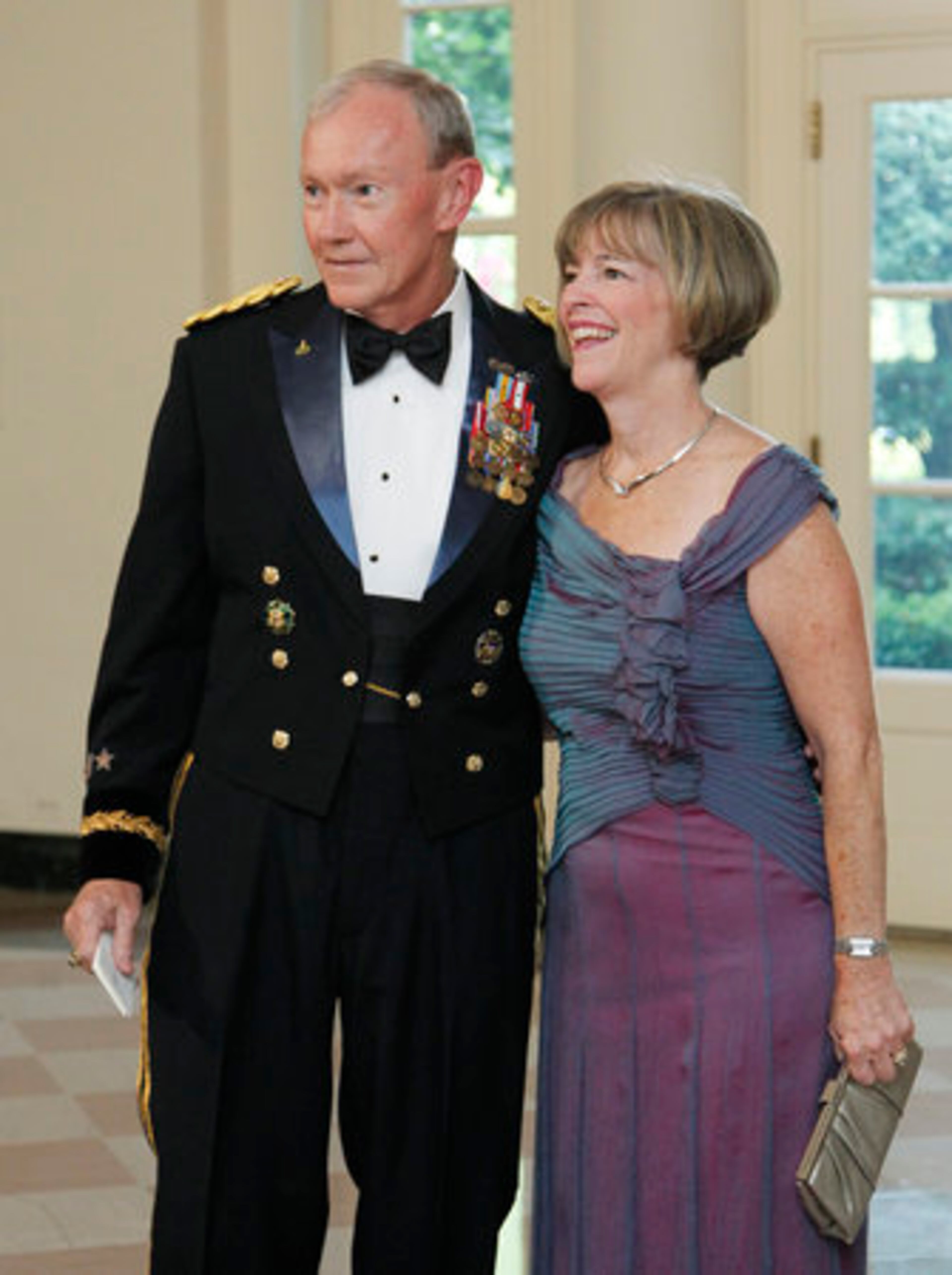 U.S. Army Chief of Staff General Martin Dempsey and his wife Deanie Dempsey arrive.