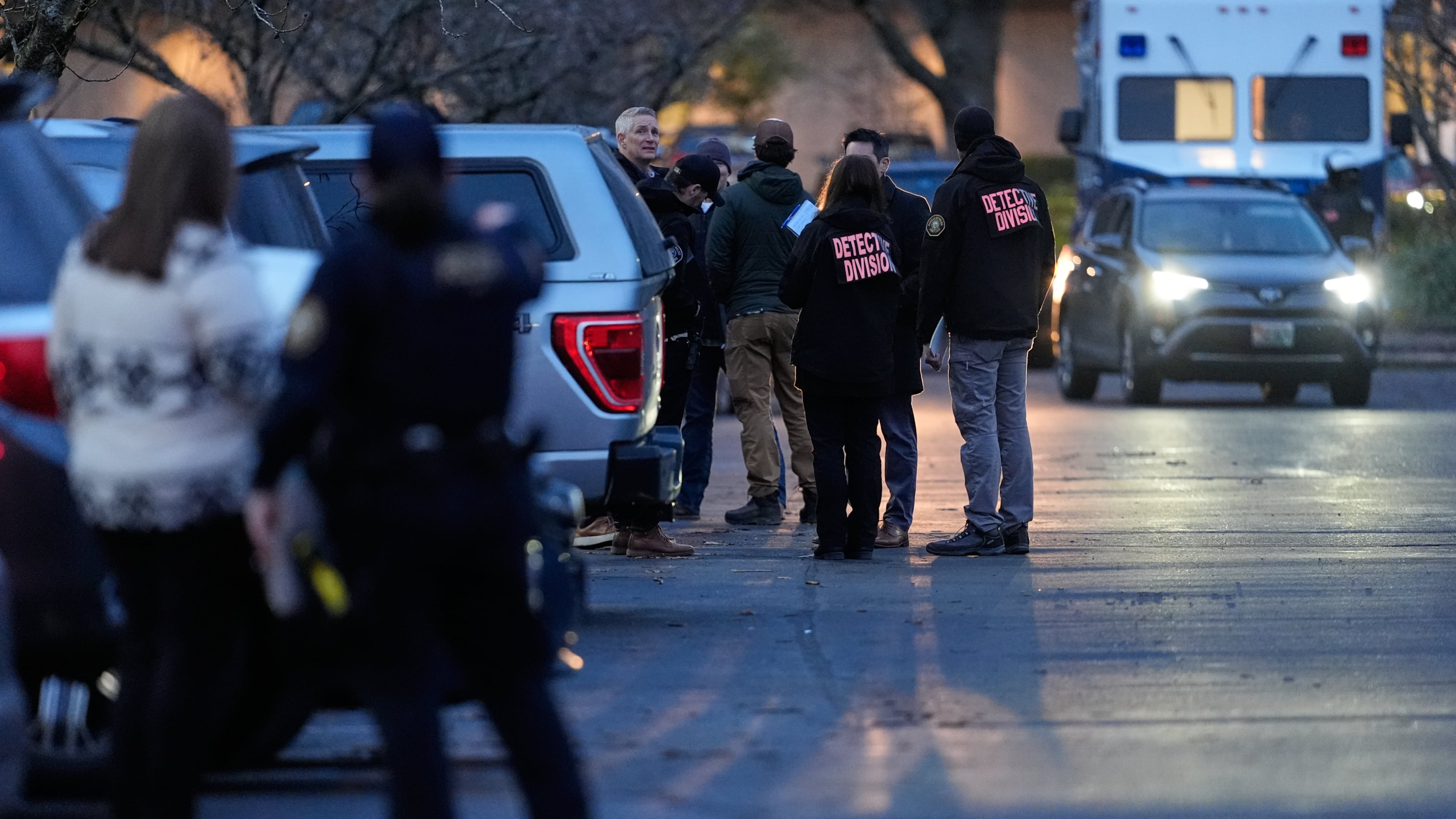 Law enforcement officials work the scene following reports that federal immigration officers shot and wounded people in Portland, Ore., Thursday, Jan. 8, 2026. (AP Photo/Jenny Kane)