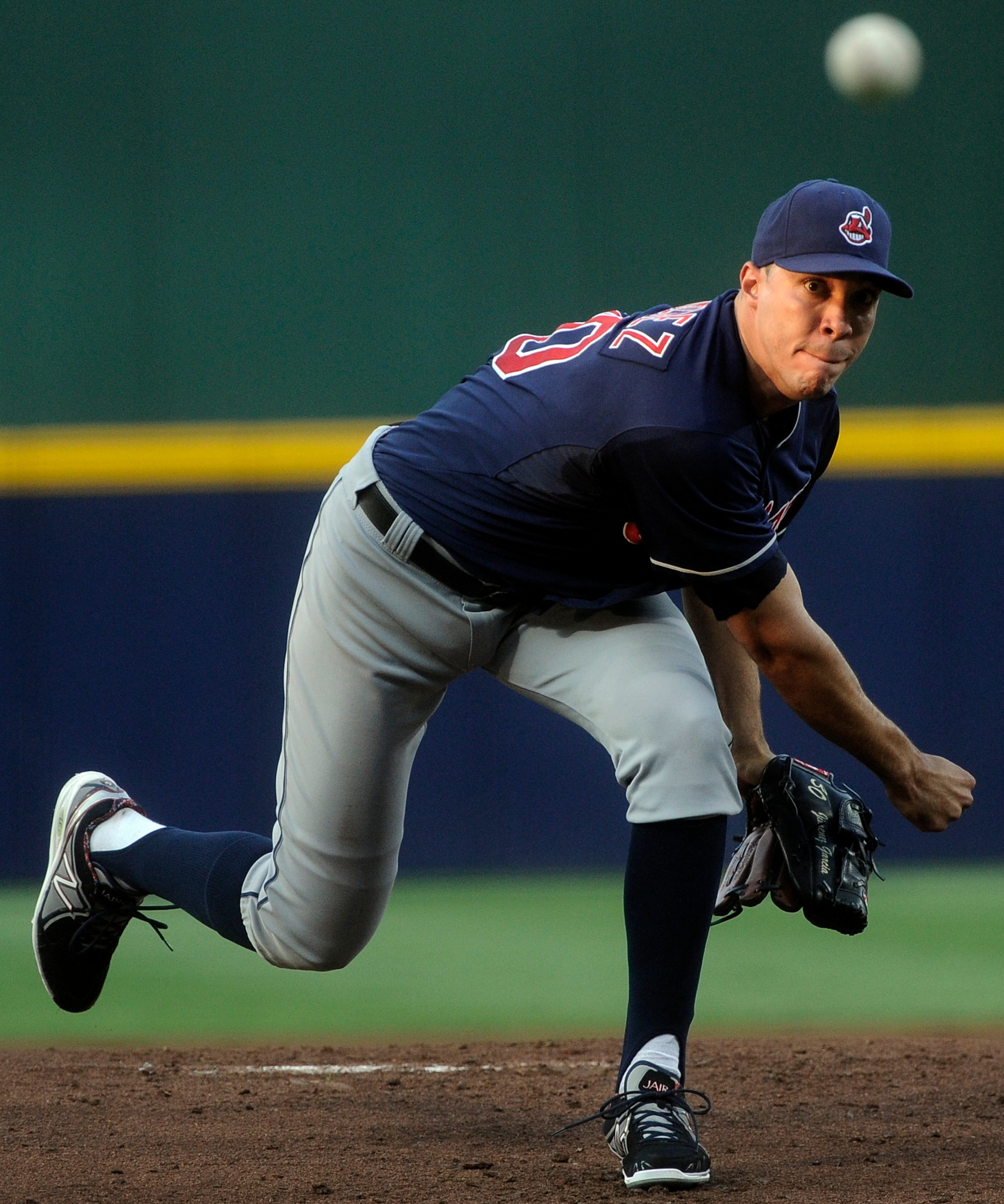 Cleveland Indians' Ubaldo Jimenez pitches against the Atlanta Braves during the first inning of a baseball game on Thursday, Aug. 29, 2013, in Atlanta. (AP Photo/John Amis)